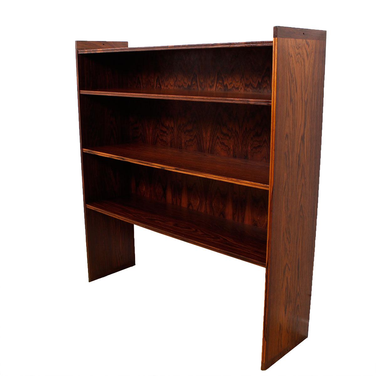 From the Royal Danish Embassy in Washington, DC we are pleased to offer this lovely bookcase by Grete Jalk. Incredible figuring in the rosewood grain. Can be placed directly on the floor or placed on top of another piece, such as a rosewood cabinet.
