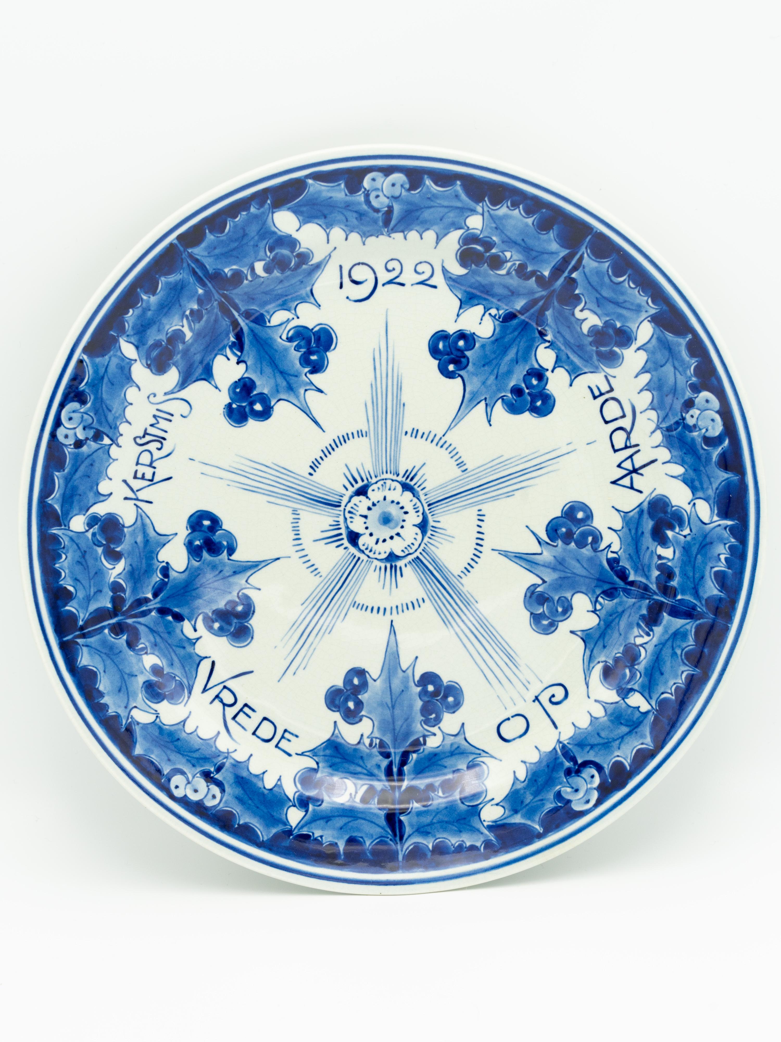 An extraordinary piece of history, this Delft blue earthenware plate, crafted by the prestigious De Porceleyne Fles, also known as Royal Delft for Christmas or 