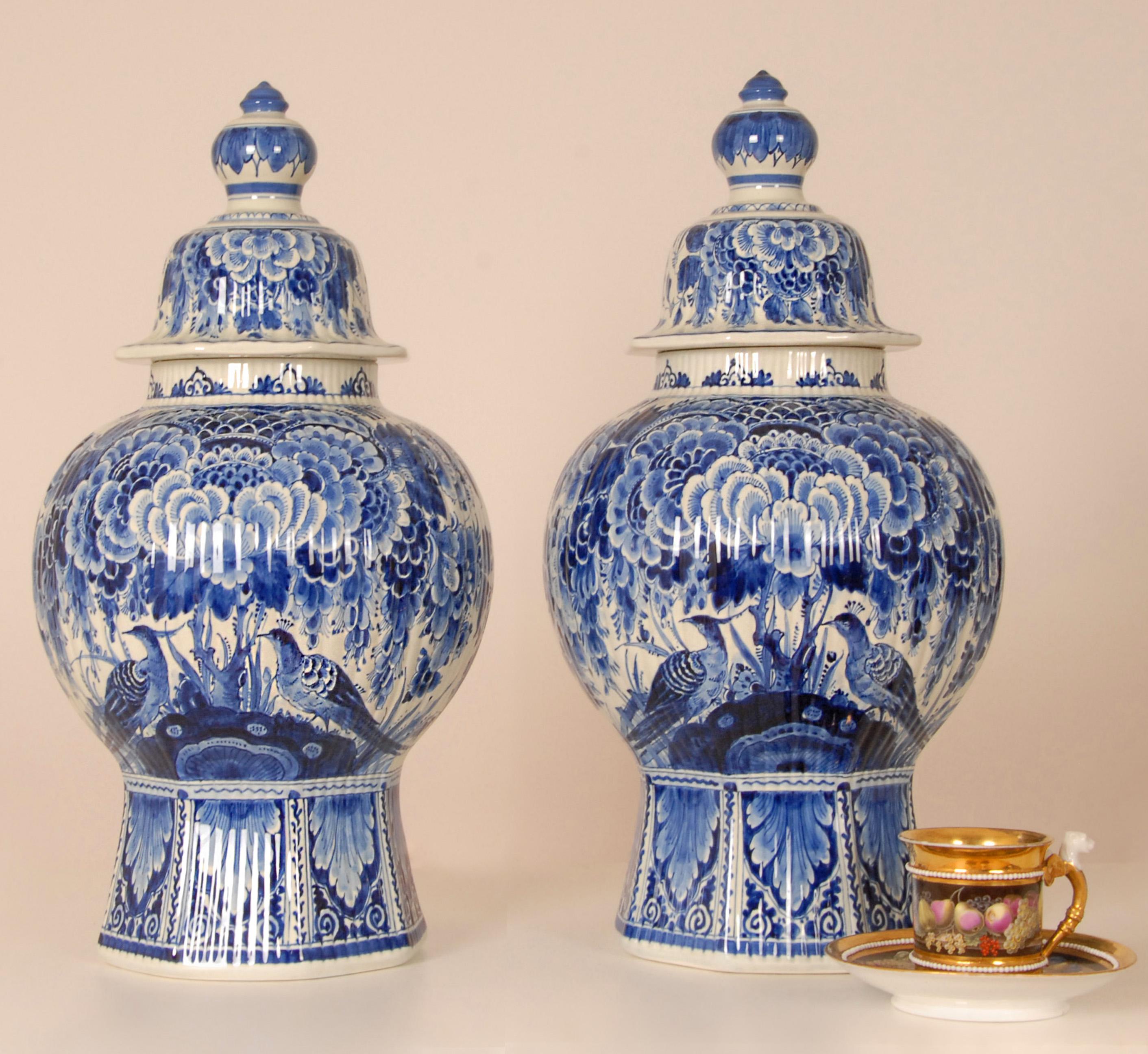A pair Dutch Delftware Royal Delft vases - Urns.
Tall decorative covered baluster vases on an octagonal foot.
The vases are hand crafted and hand painted in enchanting blue colors, blue camaieu.
We are offering tariff free delivery
Floral decoration