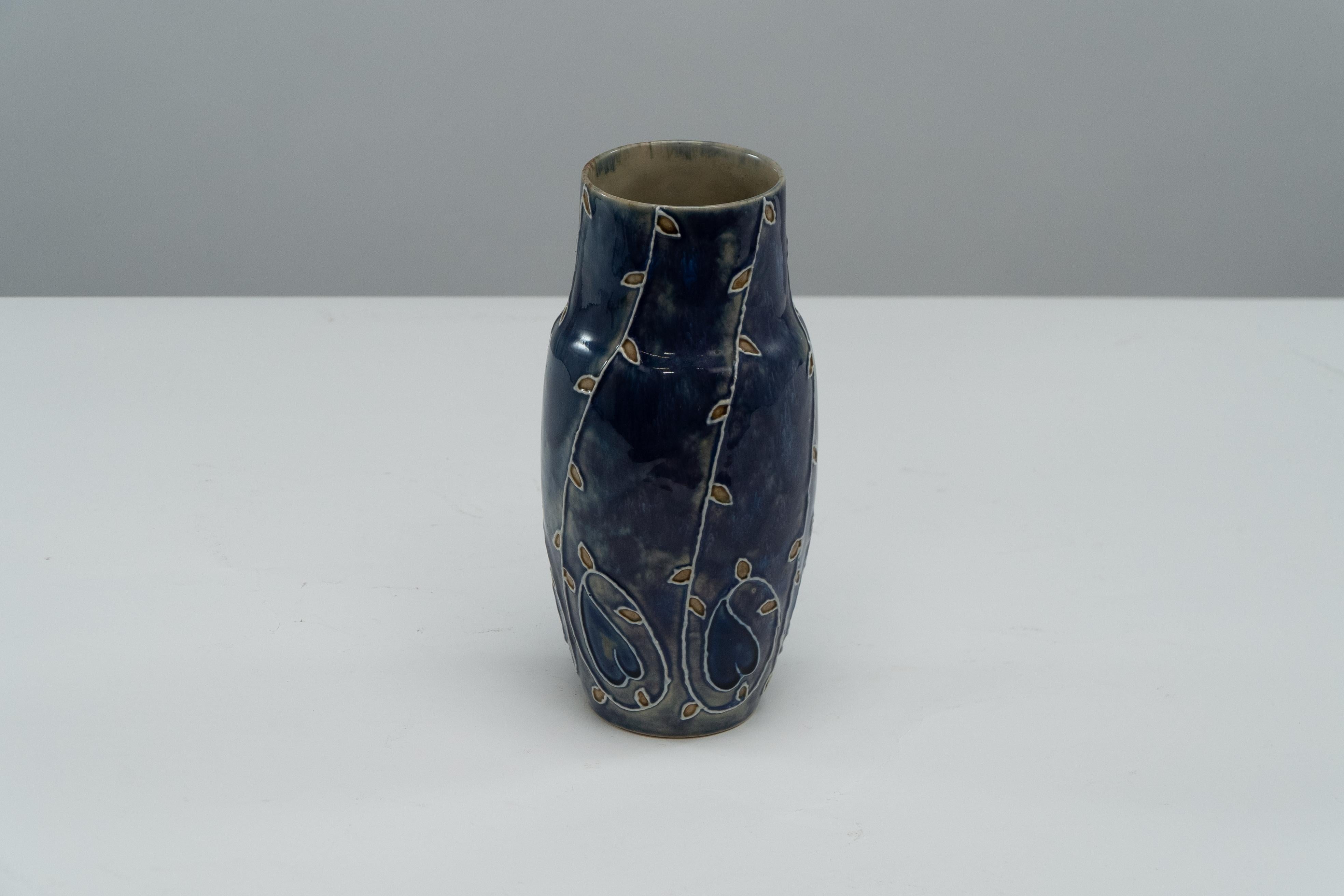 Royal Daulton signed MB for Mary Butter. Arts & Crafts flowing floral blue vase. In Good Condition For Sale In London, GB
