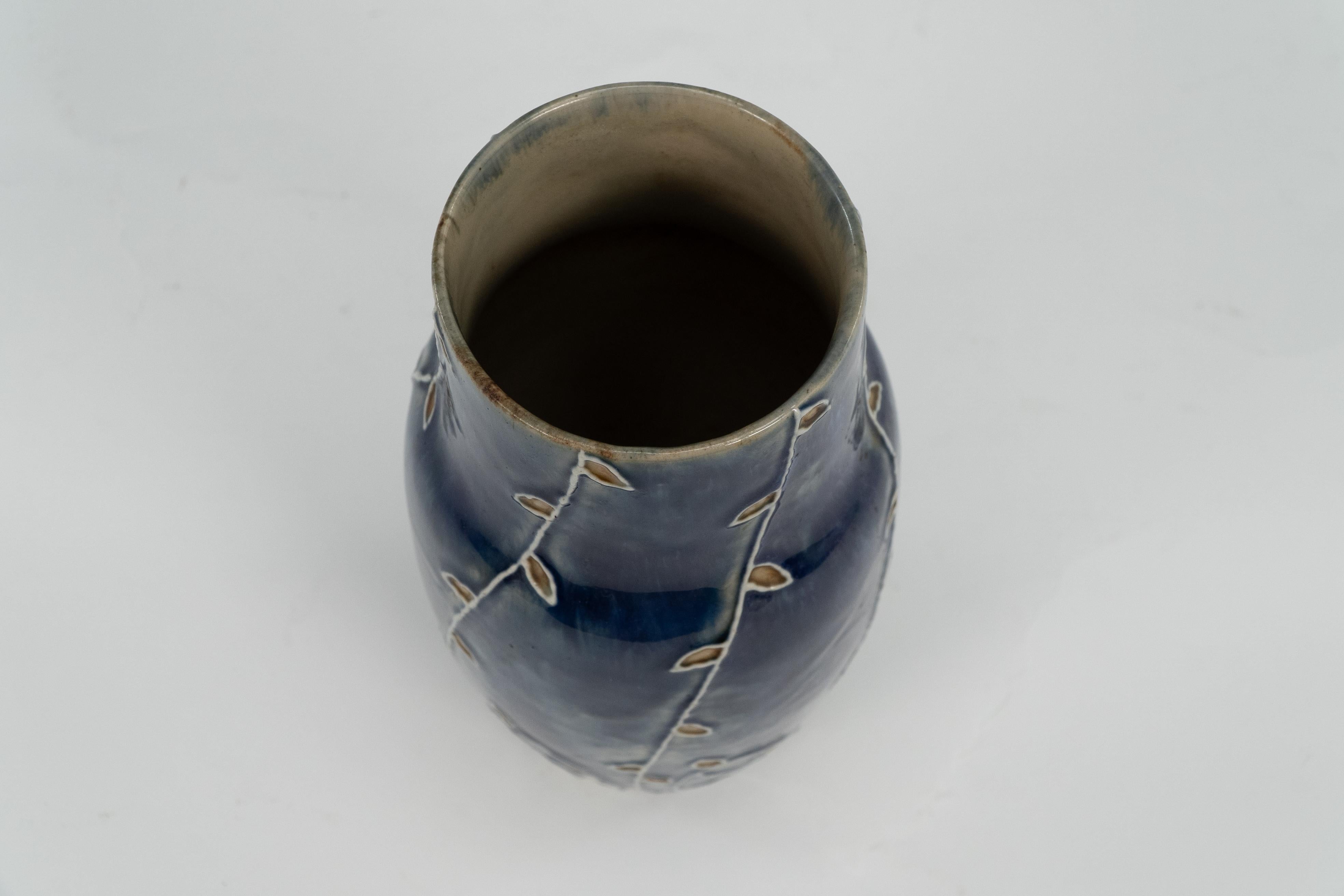 Ceramic Royal Daulton signed MB for Mary Butter. Arts & Crafts flowing floral blue vase. For Sale