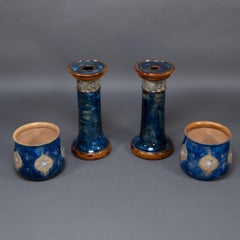 Royal Doulton. A perfect pair of jardinieres on matching stands