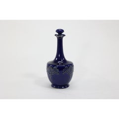 Royal Doulton. An Arts and Crafts Beefeater Gin advertising decanter and stopper