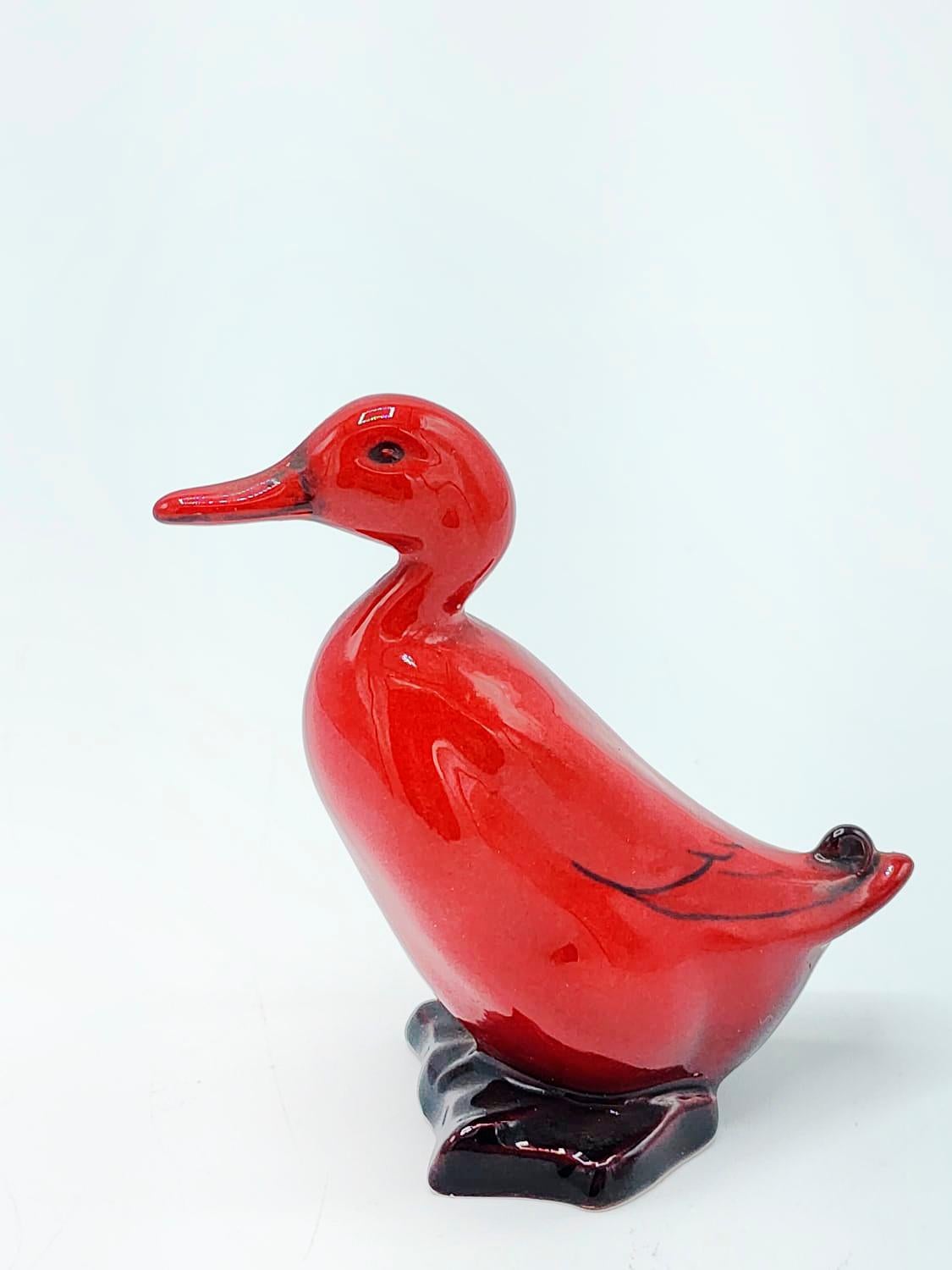 Royal Doulton Porcelain Figure made in England.
Duck Figure in Red and Black Flambe
Measures:
Height: 6 centimeters
Length: 5.5 centimeters
Depth: 2.5 centimeters
