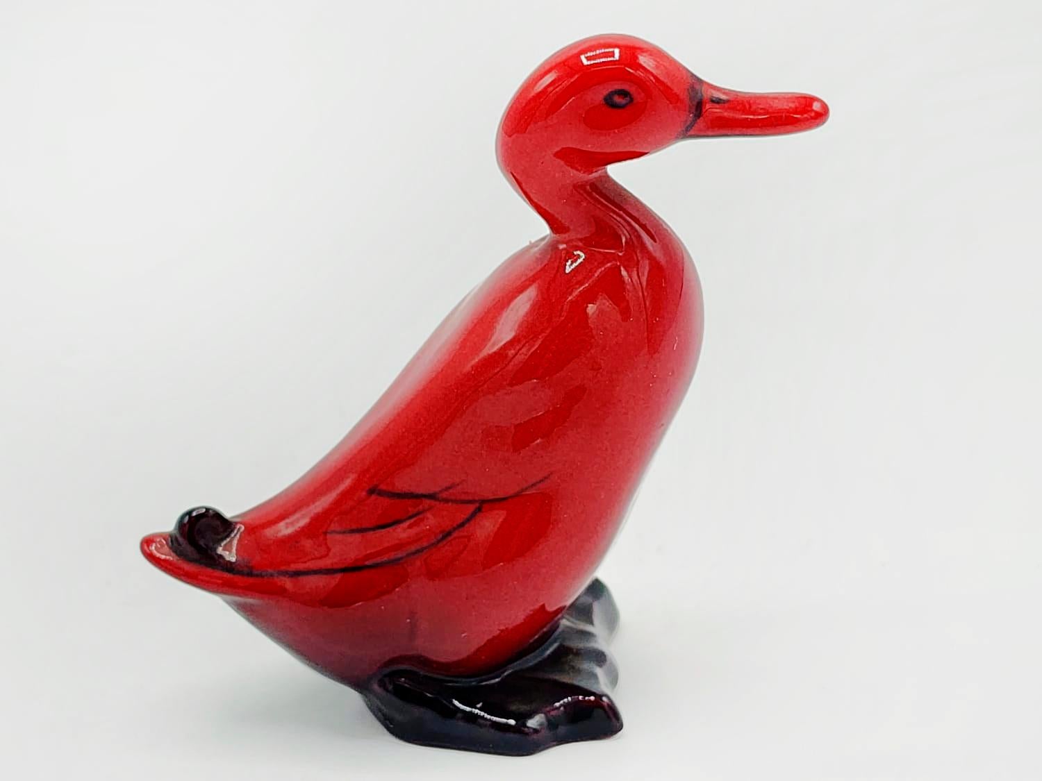 Art déco Figurine en porcelaine rouge flambée 