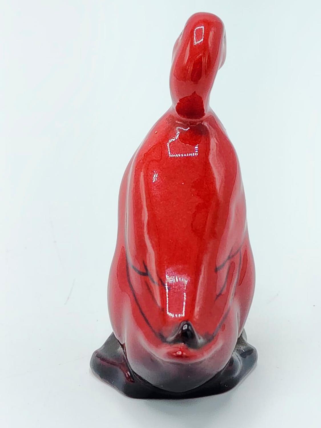 Anglais Figurine en porcelaine rouge flambée 