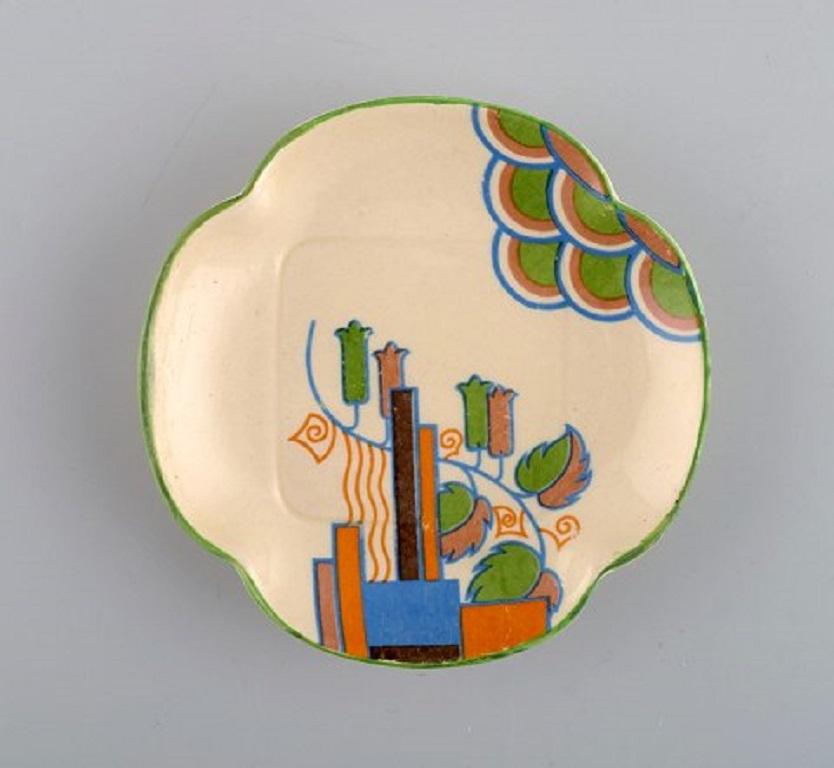 Royal Doulton, England. Caprice and marina. Bowl on base and dish in hand painted ceramics.
In the style of Clarice Cliff, (1899-1963),
circa 1940.
The bowl measures: 9 x 4 cm.
In excellent condition.
Stamped.