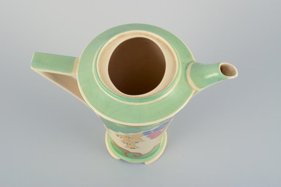 Mid-20th Century Royal Doulton, England.  'Caprice' coffee pot in earthenware. 1940s