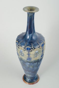 Royal Doulton, England. Slender, tall chamotte vase with blue and white hues.