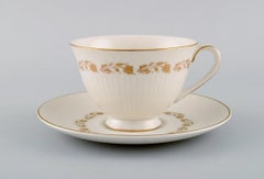 Royal Doulton, England, Twelve Fairfax Teacups with Saucers and a Cream Jug