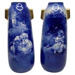 Royal Doulton pair of Blue Children vases, c. 1900.