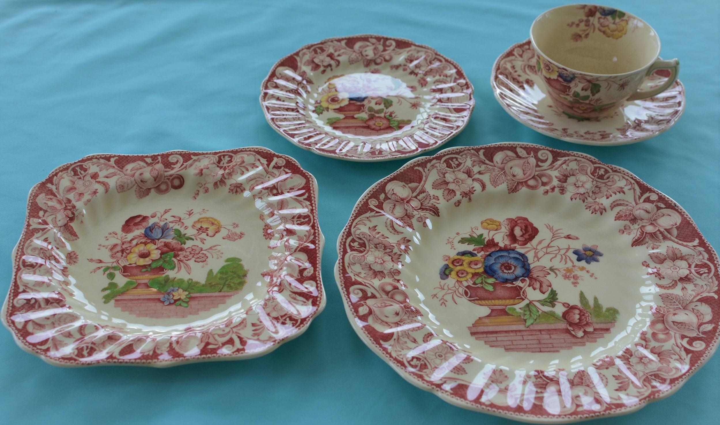 An amazing find! set of 60 pieces of Royal Doulton china in the Pomeroy red multi-color (centre design) pattern. Each piece is stamped and signed. The artwork on this set is so fine. 

Produced from the original Davenport engravings (1793). This