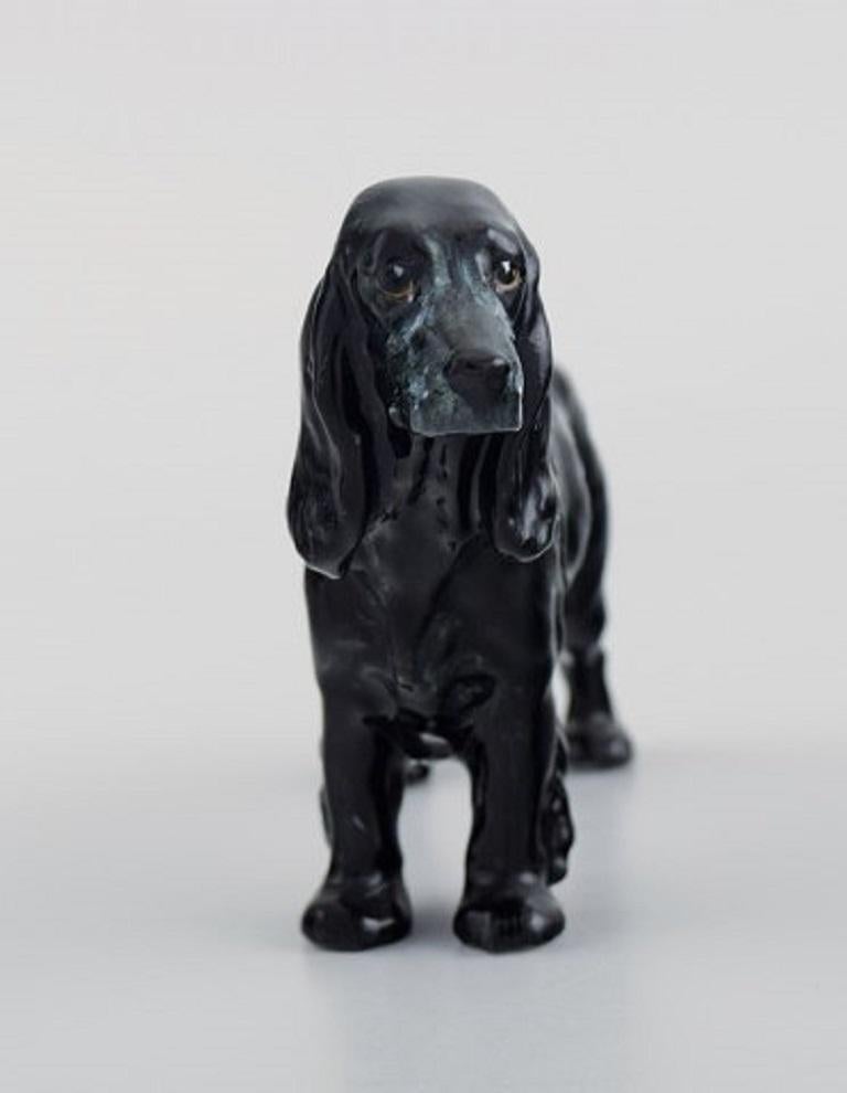Royal Doulton porcelain figurine. A black cocker spaniel, 1930s.
Measures: 13 x 8.5 cm.
In excellent condition.
Stamped.