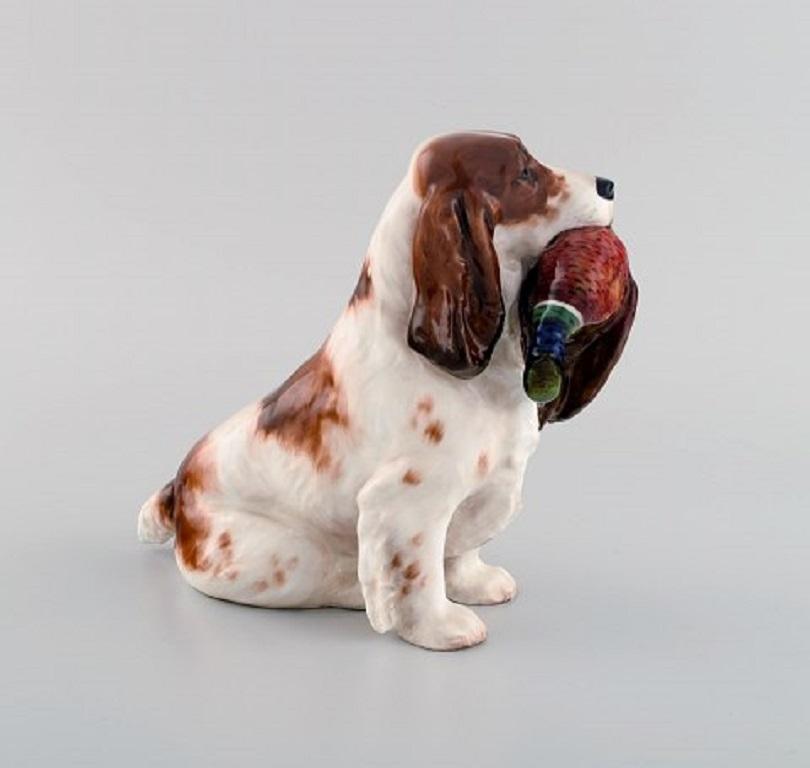 Royal Doulton porcelain figurine. Cocker spaniel with pheasant, 1930s.
Measures: 18.5 x 17 cm.
In excellent condition.
Stamped.