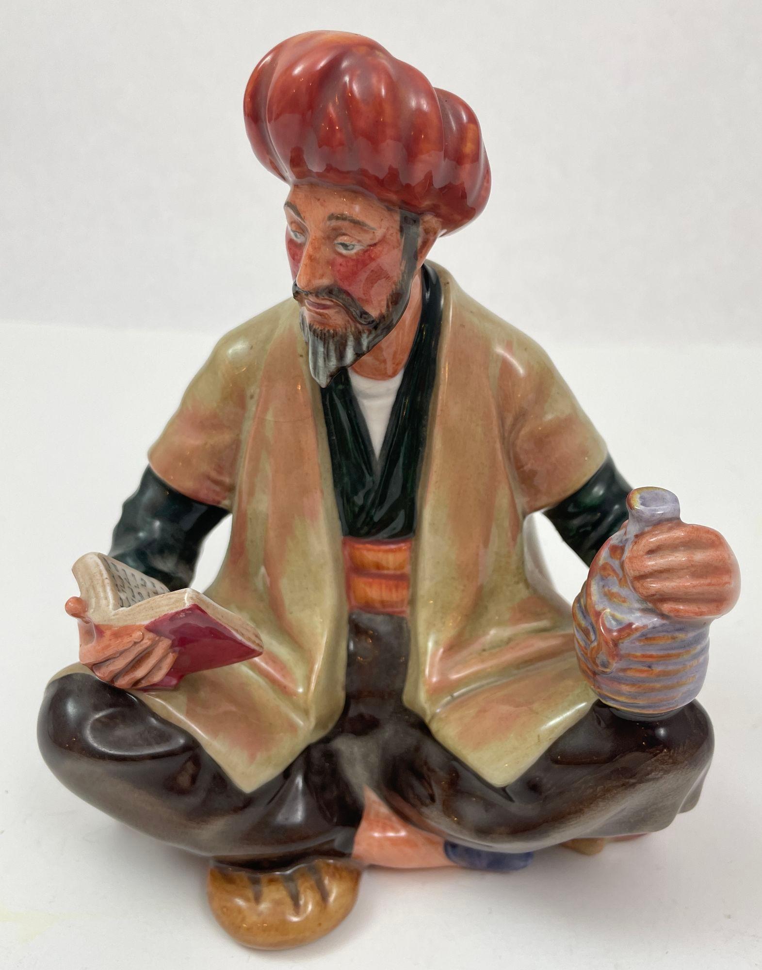 Vintage Royal Doulton “Omar Khayyam” Persian Scholar 1964 Decorative Porcelain Figurine.
Made in England, by Royal Doulton England. finely painted porcelain figure collectable, high gloss finish, marked on the bottom.
This figurine was produced in