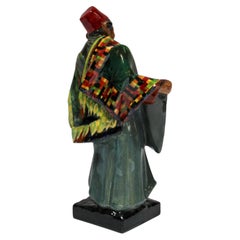 Royal Doulton "Il venditore di tappeti", statuetta decorativa marocchina in porcellana