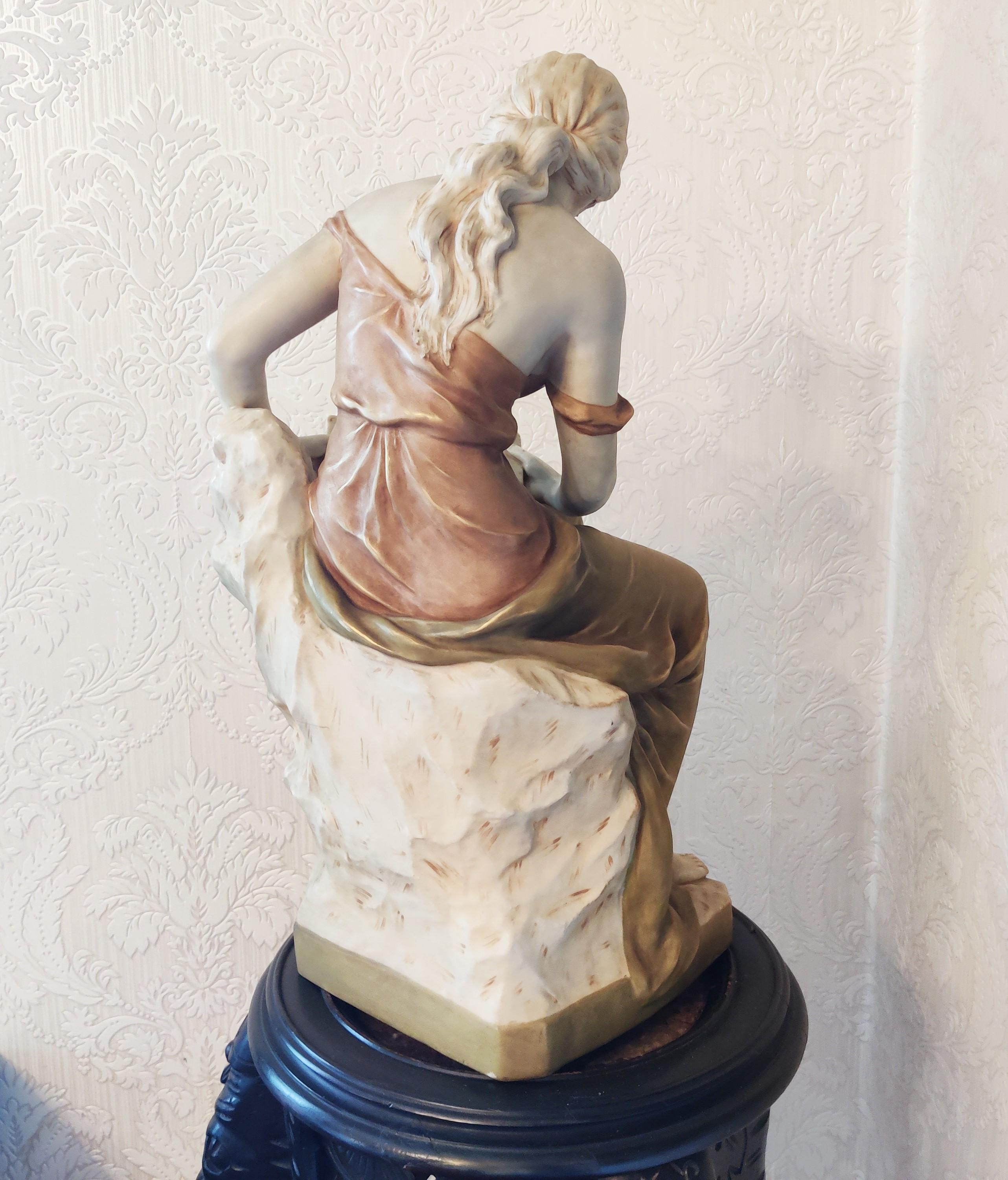Large and elegant enamelled procelain sculpture depicting a lady reading a book.

Great decorative piece with soft colours to match most interiors.

Very good condition.

This sculputre has a stamp underneath the base,

1900s, Czech