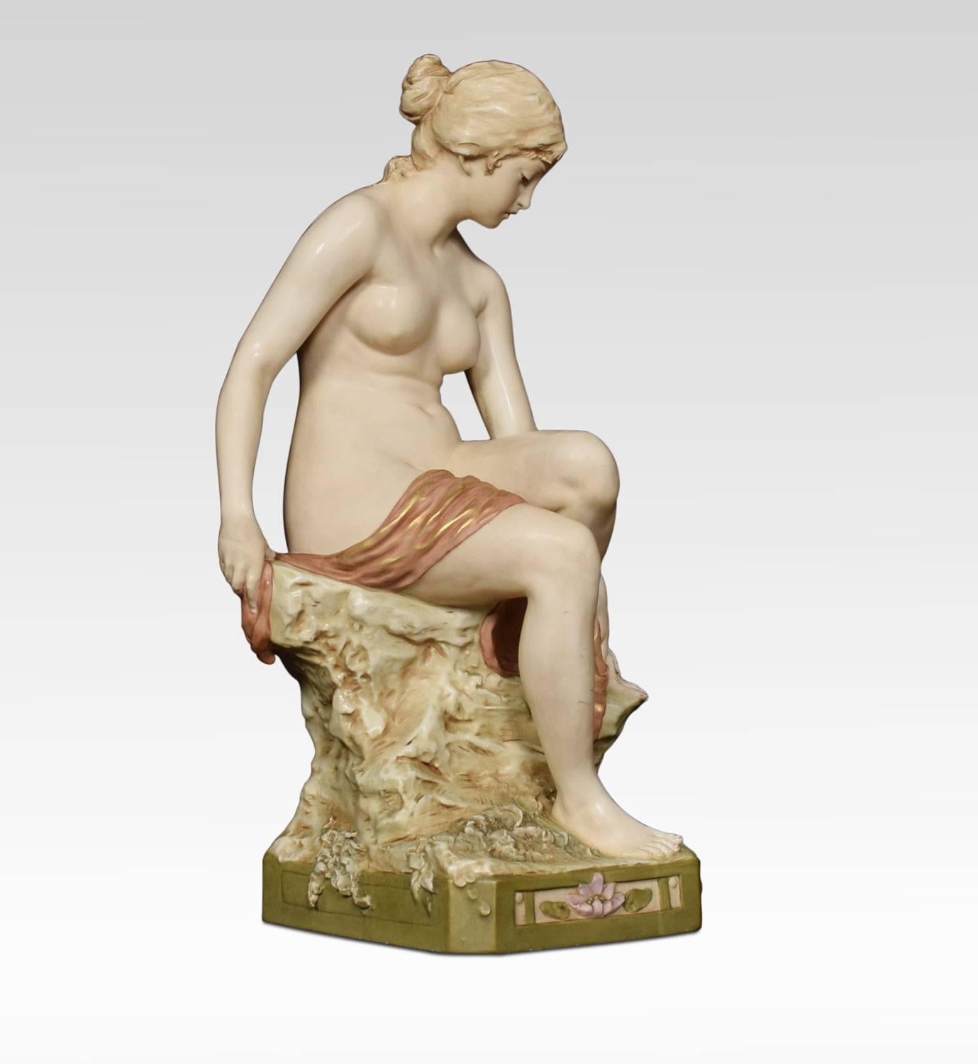 Royal Dux bohemia porcelain figure of a bather modelled seated on a rock with a towel drying her foot on canted square base, applied pink triangle.
Dimensions
Height 19 inches
Width 9.5 inches
Depth 8 inches.