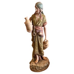 Royal Dux Bohemia Porcelain Figure of an Oriental Water Carrier, Model 1075