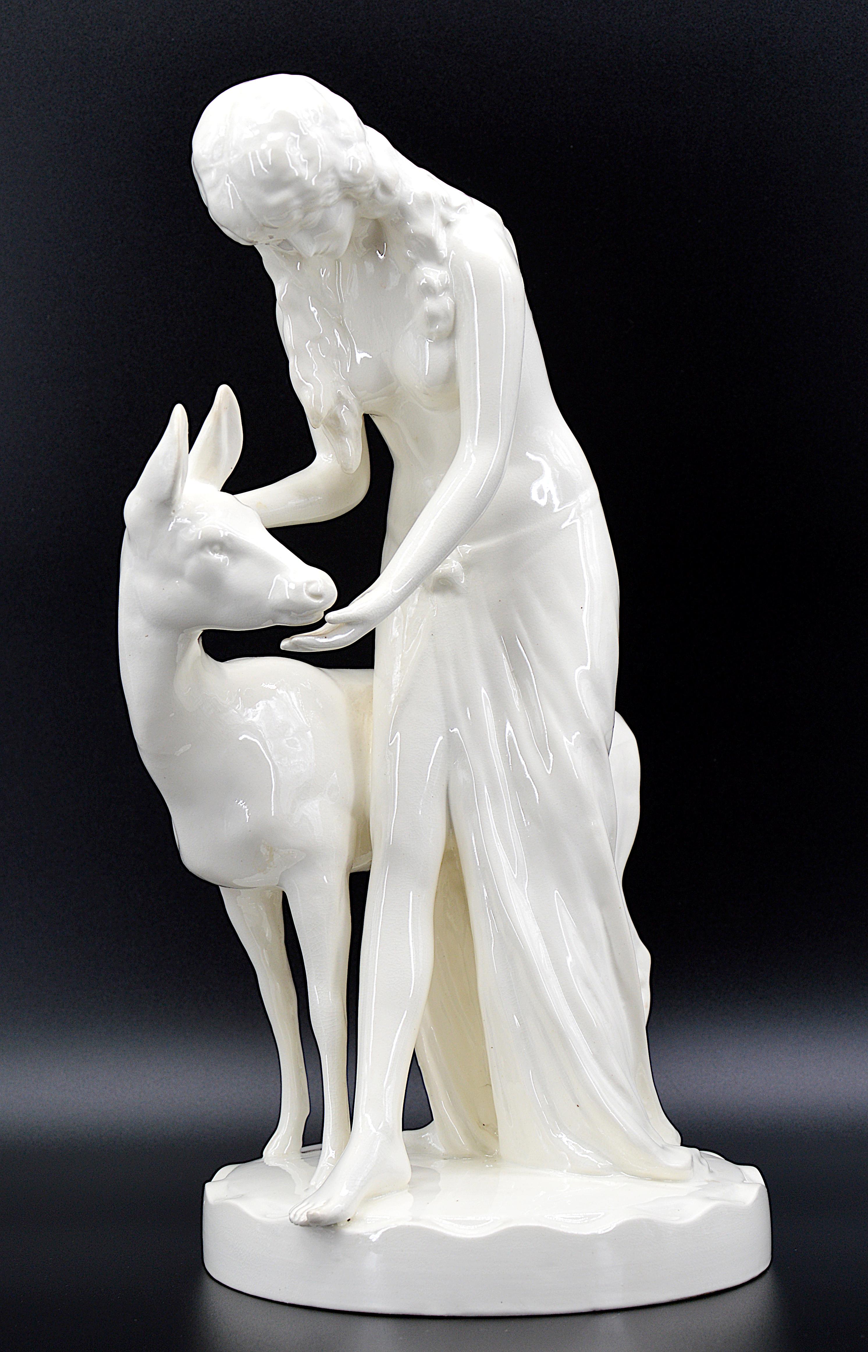Large Art Deco - Art Nouveau group in glazed porcelain biscuit by Royal Dux, Bohemia, 1919-1925. The young lady and the fan. Measures: Height 15.75