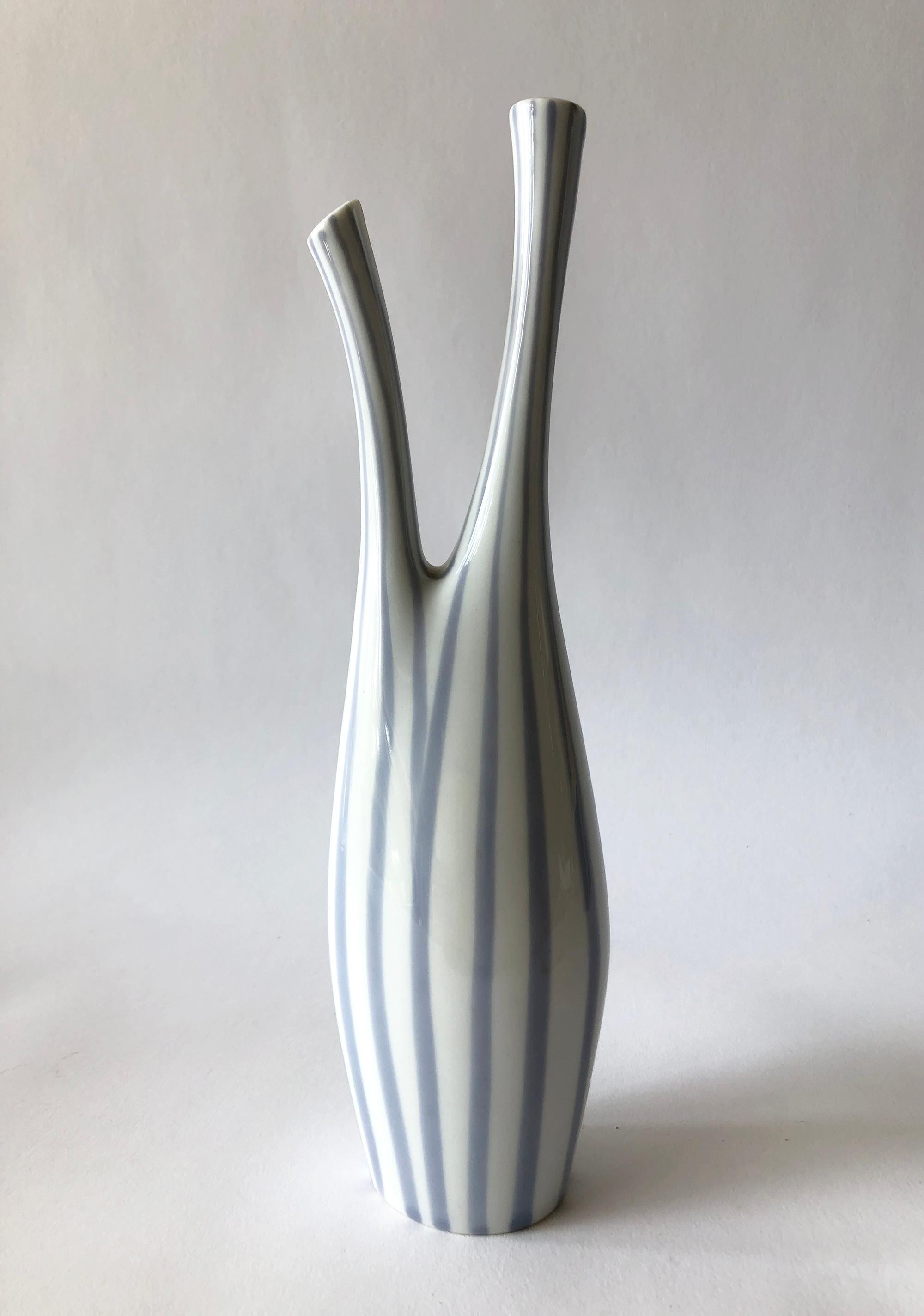Double spouted Mid-Century Modern porcelain vase created by Royal Dux of Czechoslovakia. Vase measures 9