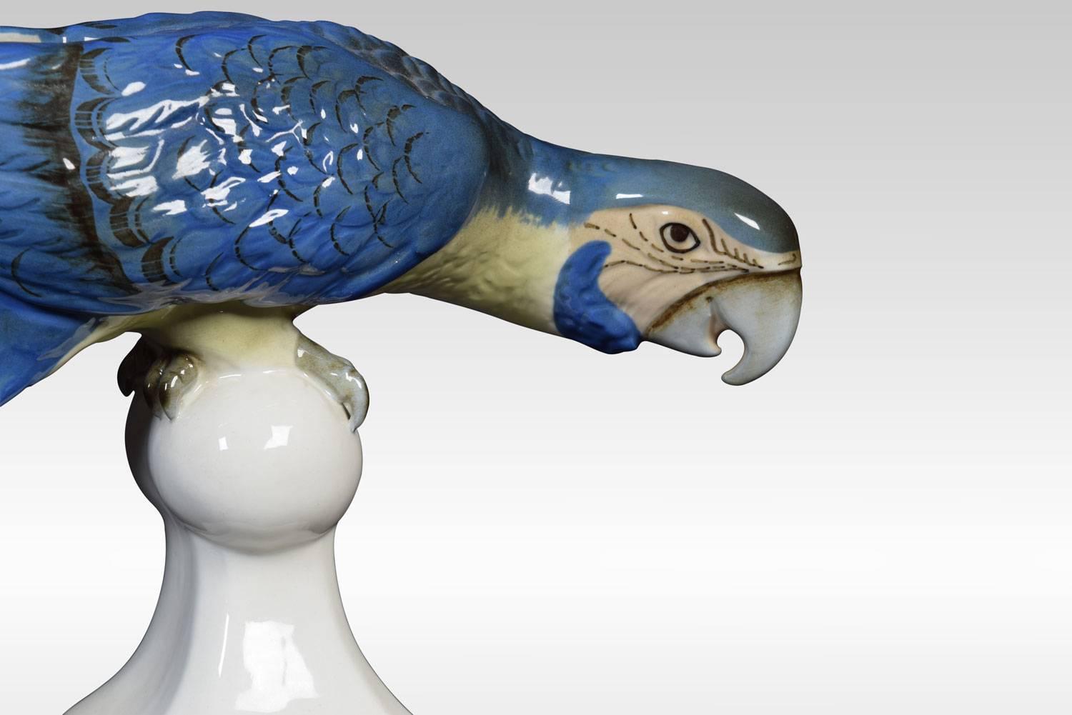 Royal Dux model of a blue macaw, perched on a Stand in typical inquisitive stance. Having pink triangle to base, together with printed and impressed marks.
Dimensions:
Height 8.5 inches
Width 17 inches
Depth 5 inches.