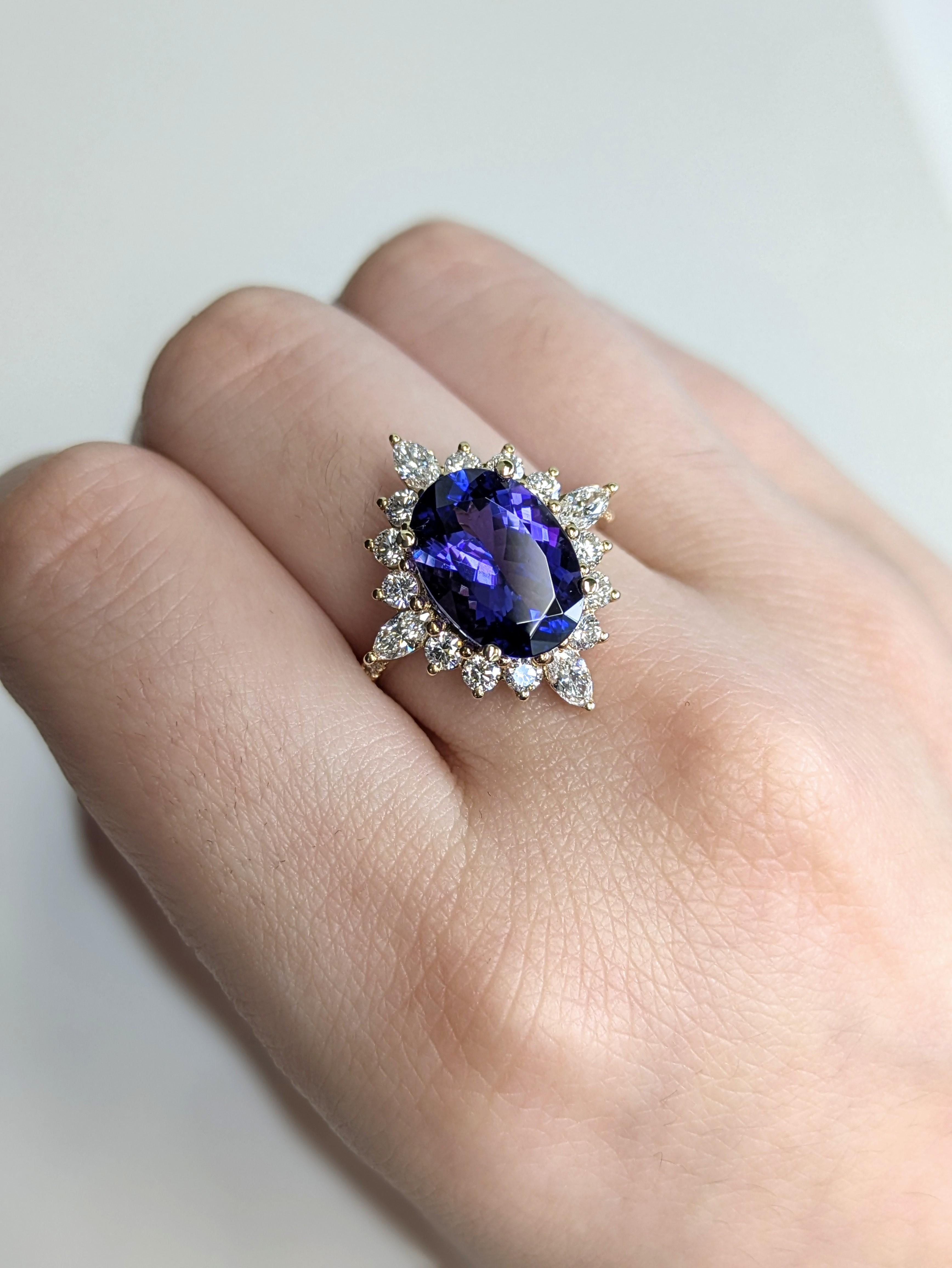 Seeking a true showstopper? This majestic 3.72-carat oval Tanzanite ring dazzles with vivid color, embraced by a radiant diamond halo and set in timeless solid 14K yellow gold. A grand heritage piece crafted to be cherished and passed down through