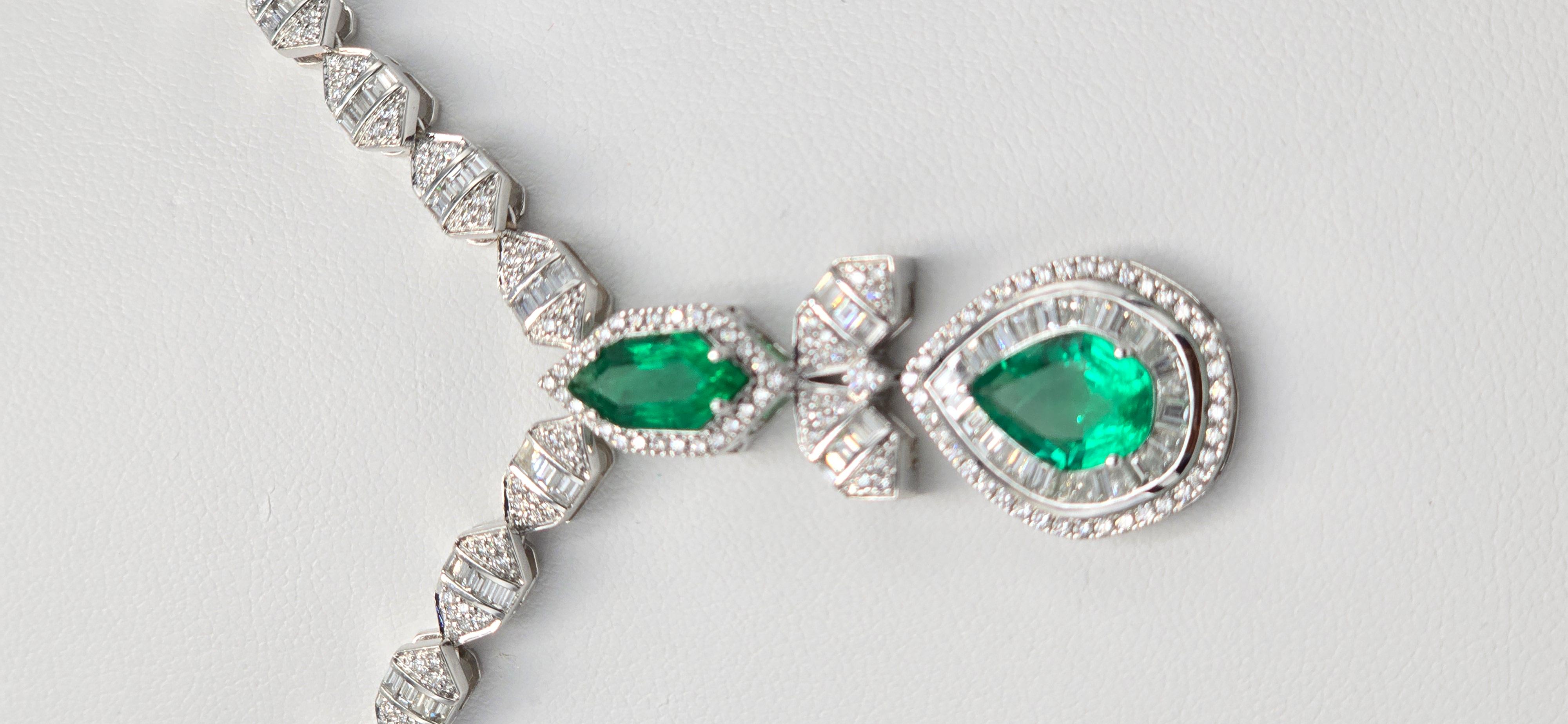 A royal jewel worthy of collection! Crafted with 18K white gold and white diamonds, this beautiful necklace and earring set is adorned by highest quality Emeralds! Top grade in Color, Transparency and Fire, this is one of our finest jewels,