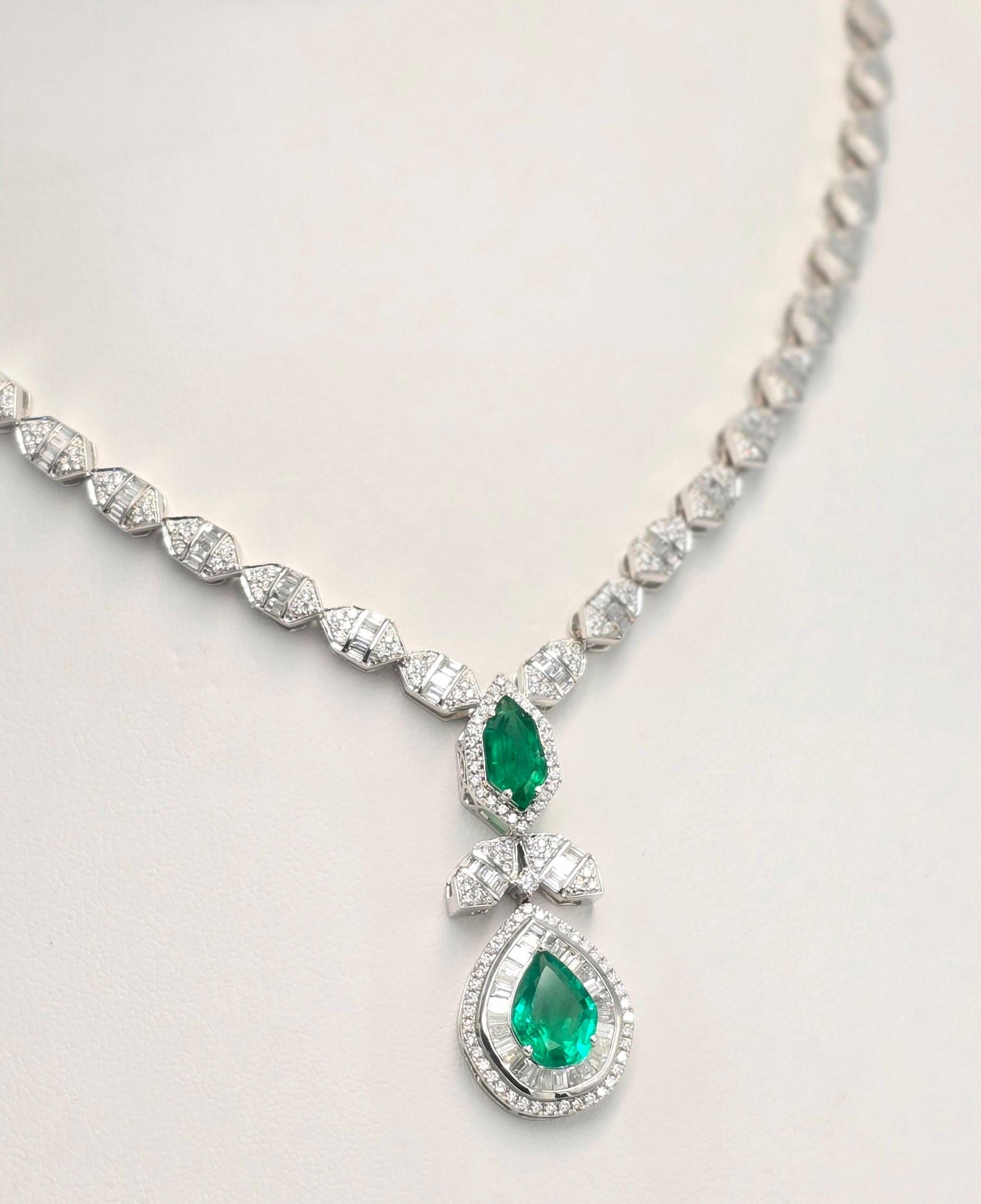 Women's Royal Emerald Necklace and earrings custom designed  in 18K white gold For Sale