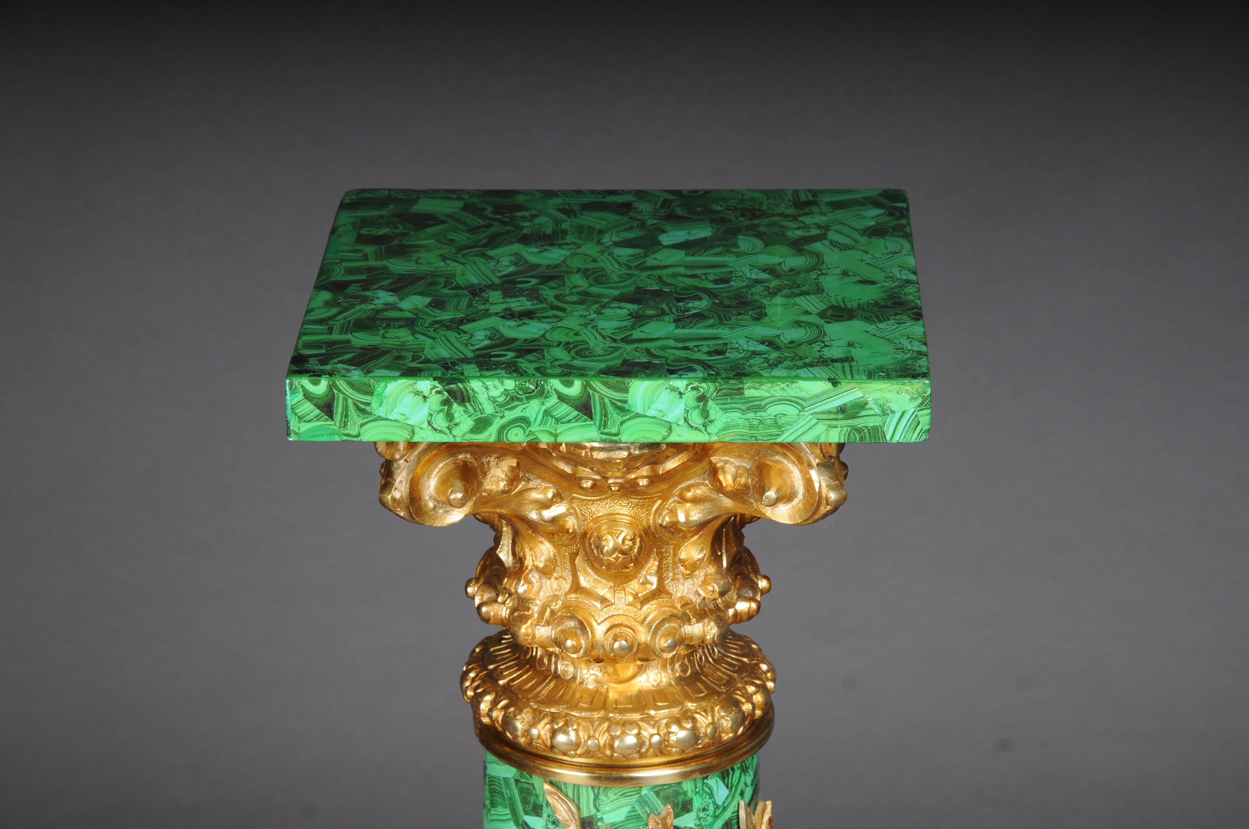 Royal Empire column with malachite and gilt bronze

Impressive and regal wooden column with bronze mounts in Empire style. Solid wood coated with malachite painting technique. Such a column is guaranteed to be a real eye-catcher and something very