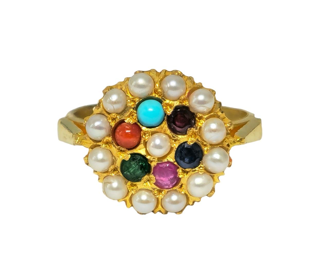 Indulge in exotic elegance with this captivating ring, crafted from lustrous 22k yellow gold. Adorning the ring are an array of vibrant gemstones, including pearls, emeralds, rubies, blue sapphires, coral, pink sapphires, and turquoise. Weighing