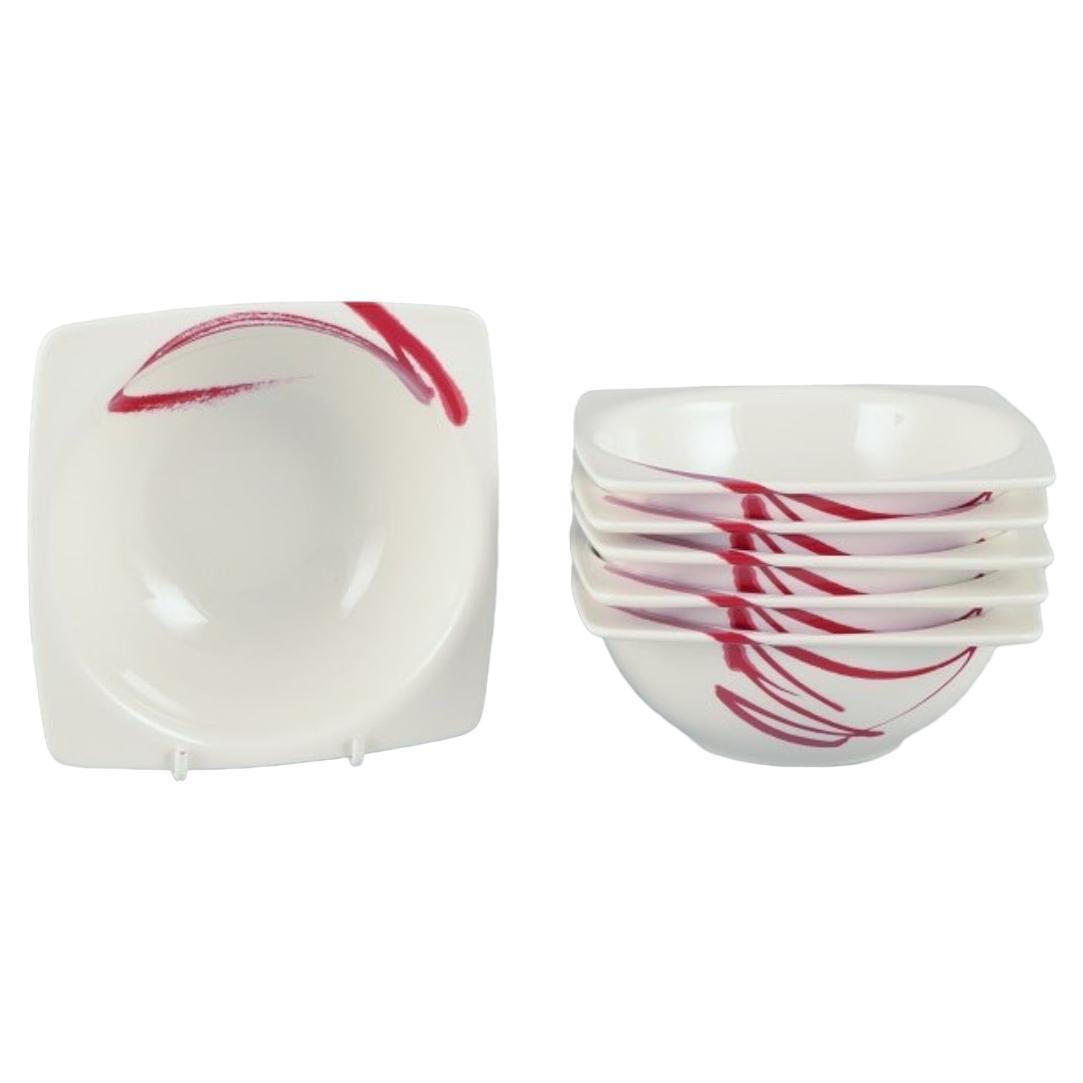 Royal Fine China, set of six "Paint It Red" porcelain bowls. 