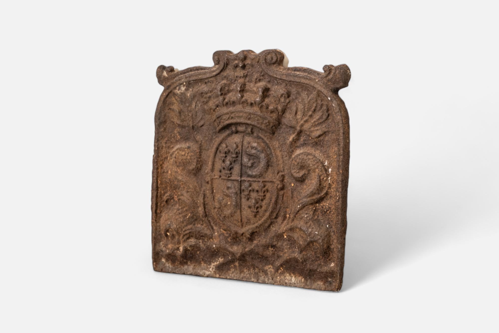 French Fireplace Shield with Royal Coat of Arms, a Piece of French Heritage from the 17th century

Weight: 55 Lbs.

Measurements: Size: 19 x 18 1/4 in. (48.3 x 46.4 cm.)