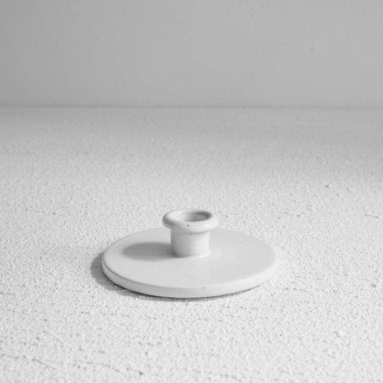 Royal Goedewaagen, candle holder, The Netherlands, early 20th century.    A very minimal and therefore distinct piece. This candle holder has a very honest and straightforward shape and looks timeless and modern, although this candle holder is at