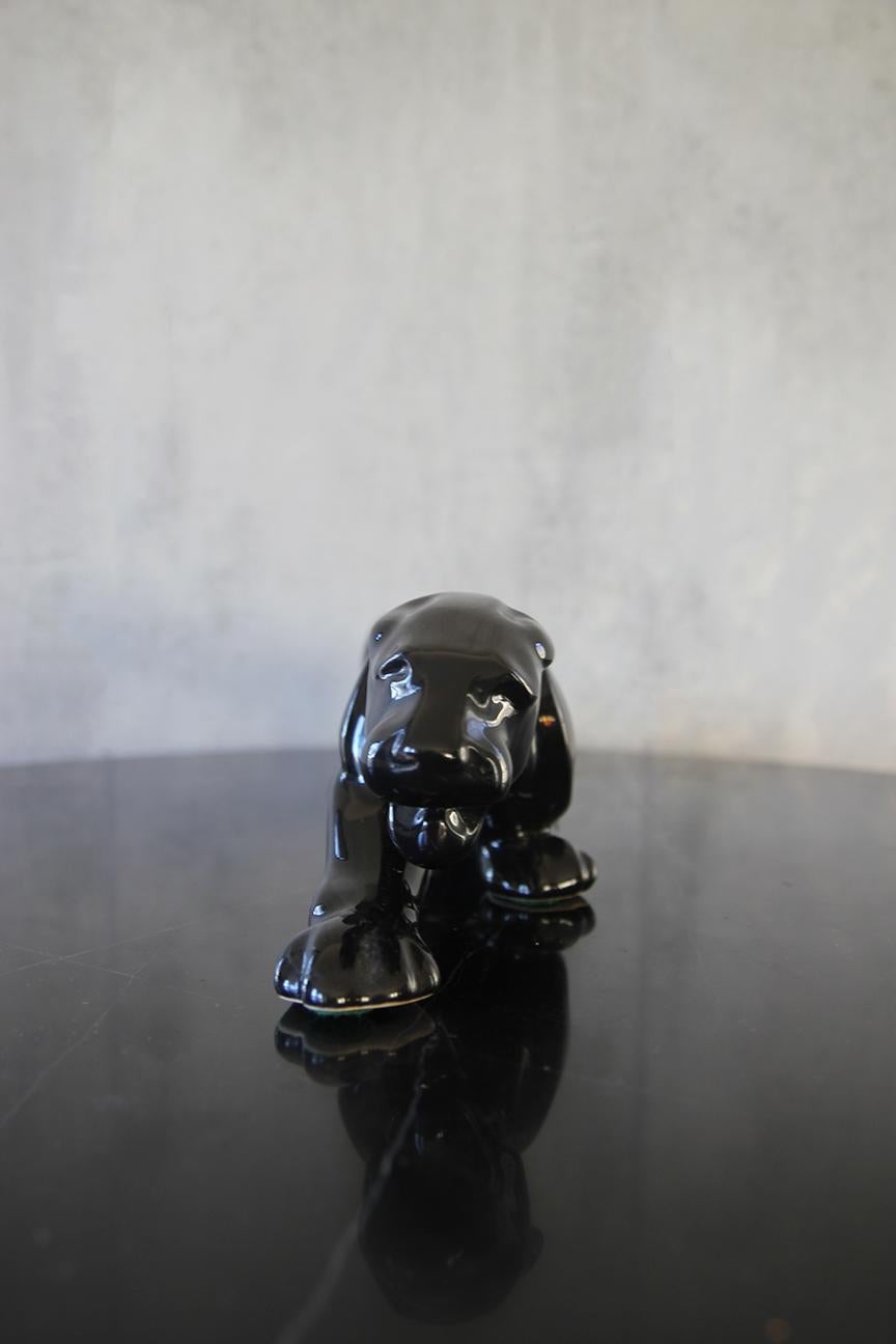 Superbe sculpture de panthère noire en céramique de style Royal Haeger. Magnifique état vintage, sans fissures, éclats ou craquelures. circa 1950-1960. Cette bête est une véritable beauté. Dans le style de Royal Haeger. Il s'harmonise avec de