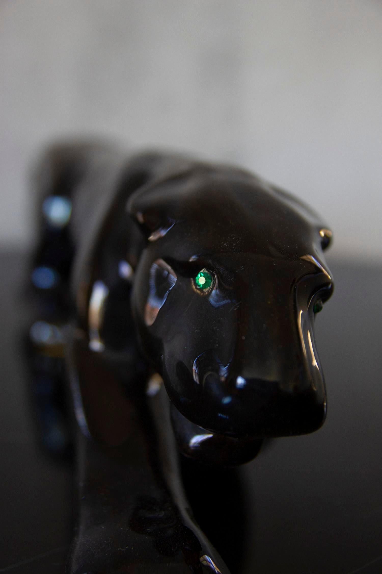 ceramic black panther with green eyes