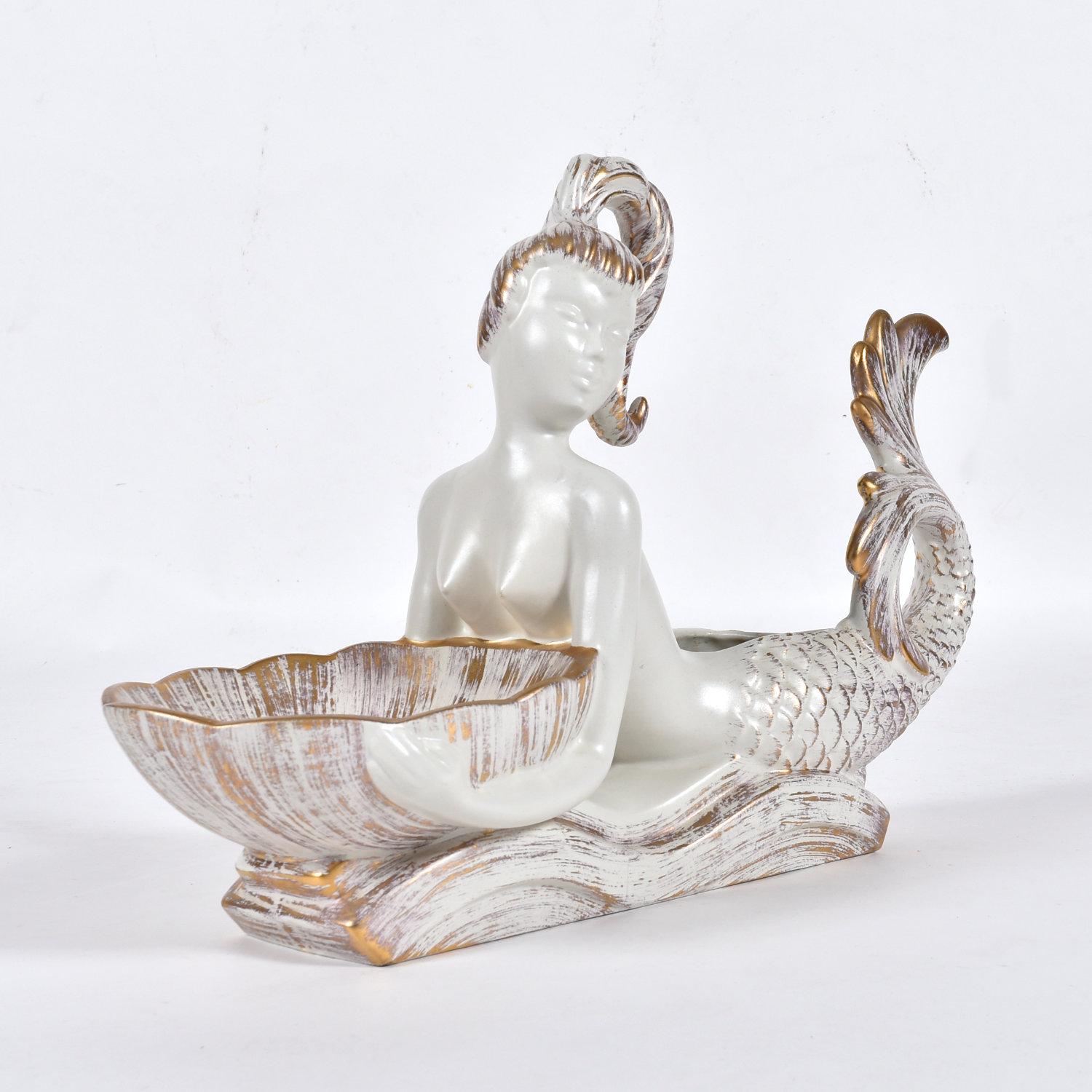 Mid-Century Modern Gold Tweed decorative ceramics set by Royal Haeger. This set includes a stunning 23? long mermaid planter. This gorgeous mermaid is white with 22k gold leaf accents. She is lying on her belly, holding a bowl that can be used as a