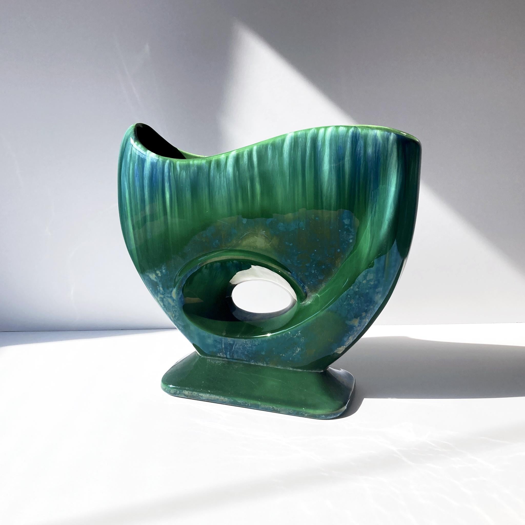 Stunning Royal Haeger Green abstract vase, medium size, model R886. Looks stunning on its own or as part of a group. The drip glaze catches the light beautifully, and there is a light luster glaze over the green. In good vintage condition, some