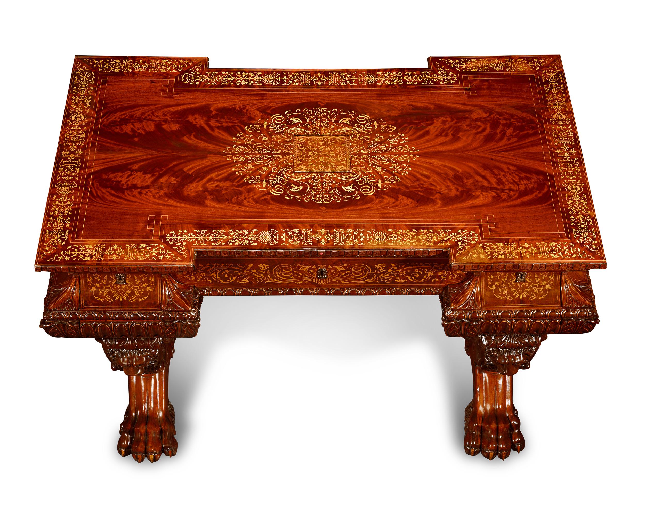 This Italian carved mahogany writing table is said to have been crafted specifically for use by King Carlo Alberto (Charles Albert of Sardinia, 1798-1849). Both beautiful and functional, the desk and armchair feature complex woodwork with elaborate