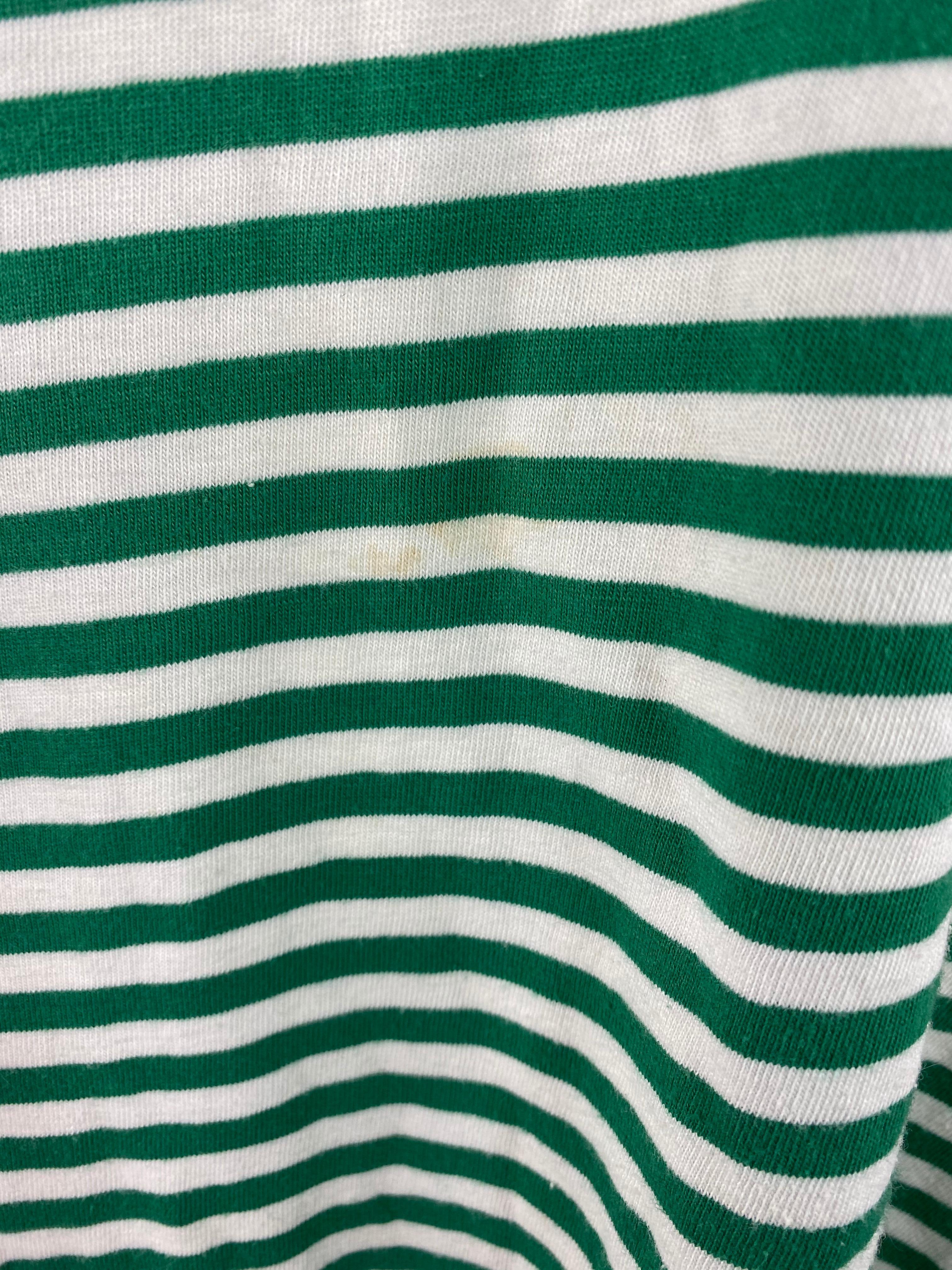 Product details:

The T- Shirt features 100% cotton, green and white striped pattern with two gold buttons detail on each sides, crew neck line with short sleeves. Made in France.