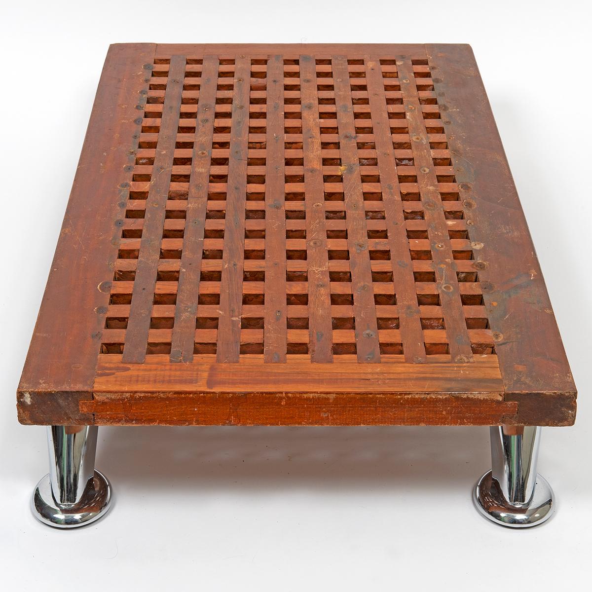A practical coffee table using a ship's grating (above the captains cabin) with fitted legs. This grating comes from a Royal Navy vessel, is beautifully weathered and would ideally suit an inside or outside / conservatory environment. We date the