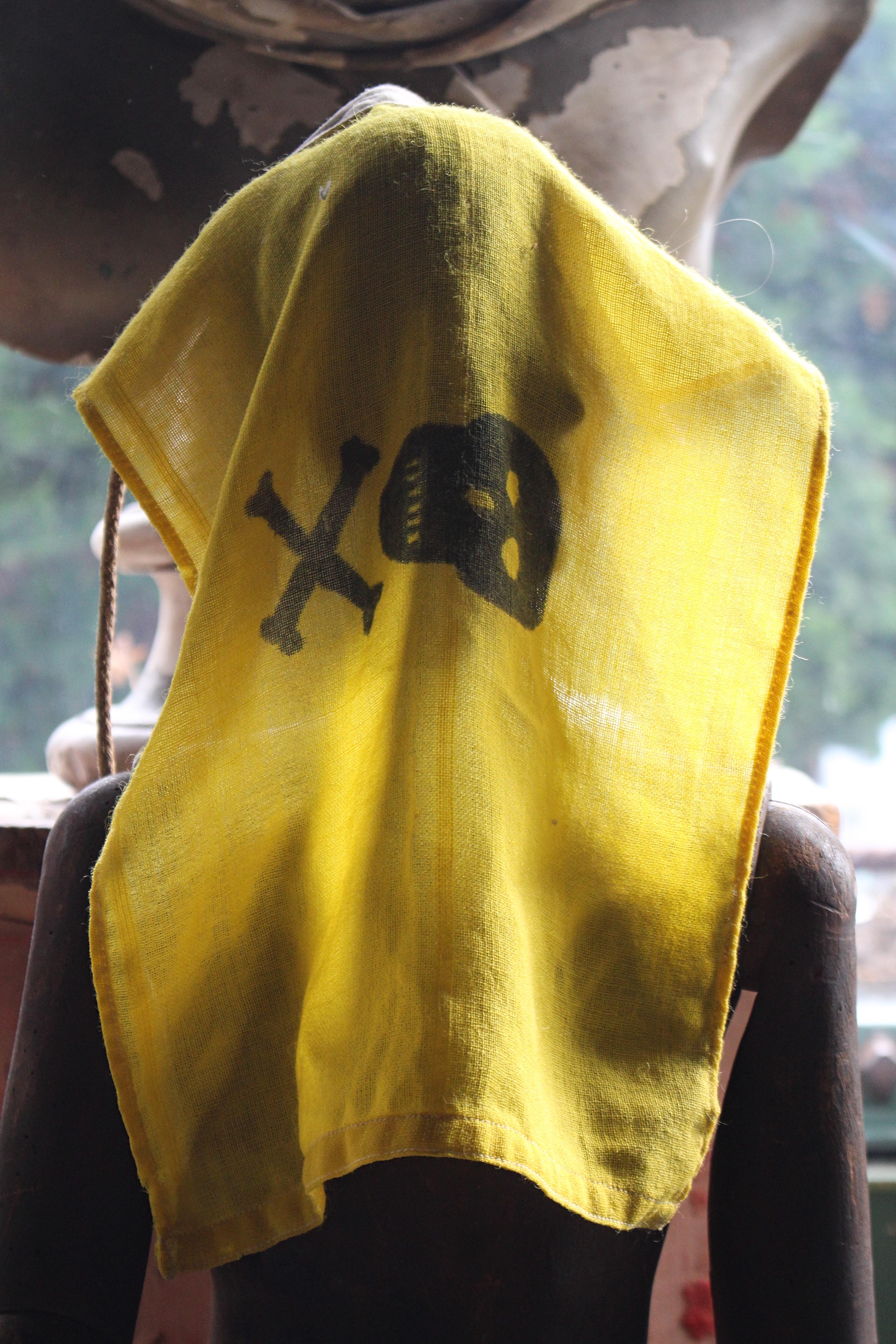 Fascinating example of Royal Navy Folk Art History.

This is a Royal Navy Yellow Jack Jolly Roger Flag.

Hand made on board ship it is Royal Navy tradition to make a Jolly Roger flag when special forces are traveling with them.

Made from Hessian