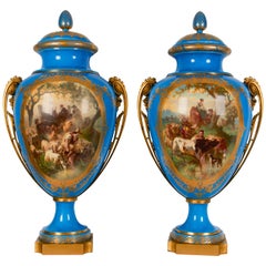 Paire royale de vases et de couvercles en porcelaine de Sèvres "Exposition de Paris 1867".