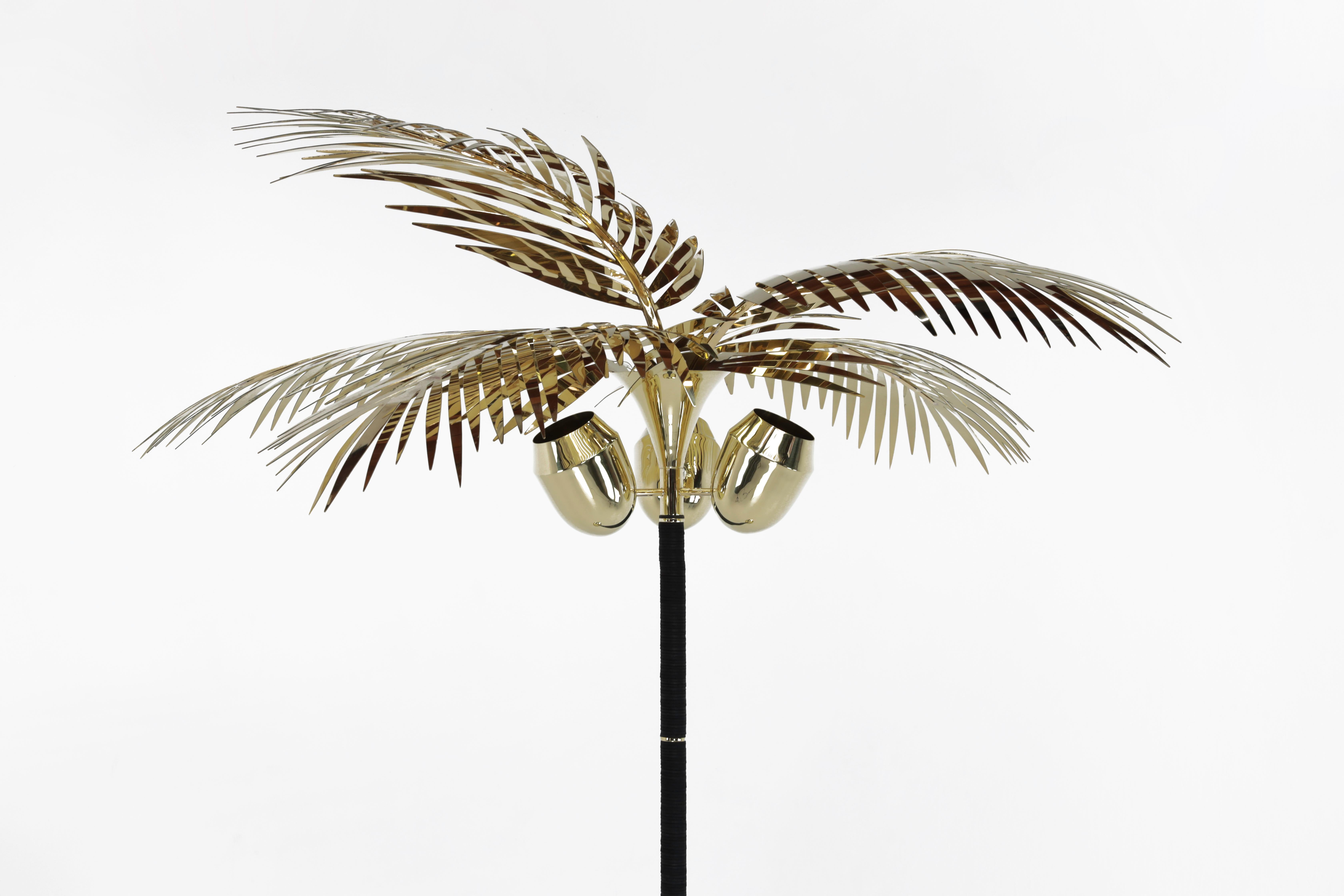 The Royal palm floor lamp is a celebration of living and creating in Los Angeles for almost two decades. The palm tree is as much a sculpture as it is a floor lamp.
The body is made of stacked saddle leather, brass, all hand-sculpted, and polished.