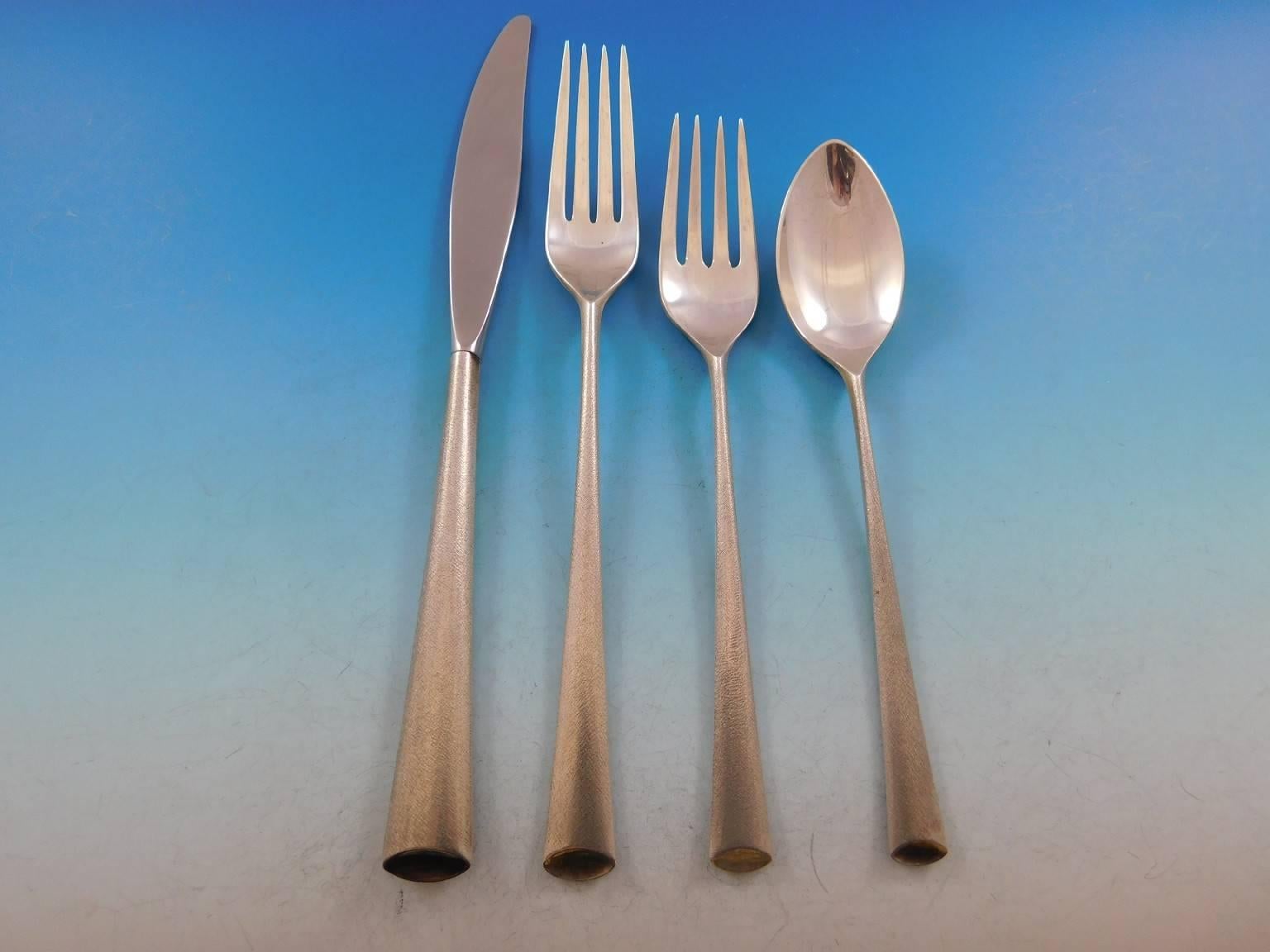 Mid-Century Modern Royal Satin by Wallace, circa 1965 sterling silver flatware set, the handles with satin/matte finish, 55 pieces. This set includes:

 Measure: 12 knives, 9