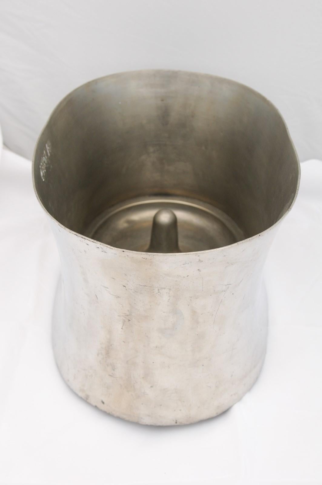 A Royal Selangor Dom Pérignon pewter double champagne bucket from the mid 20th century. Commissioned by some of the most prestigious luxury companies, including LVMH (Louis Vuitton Moët Hennessy) to produce champagne accessories for their brands