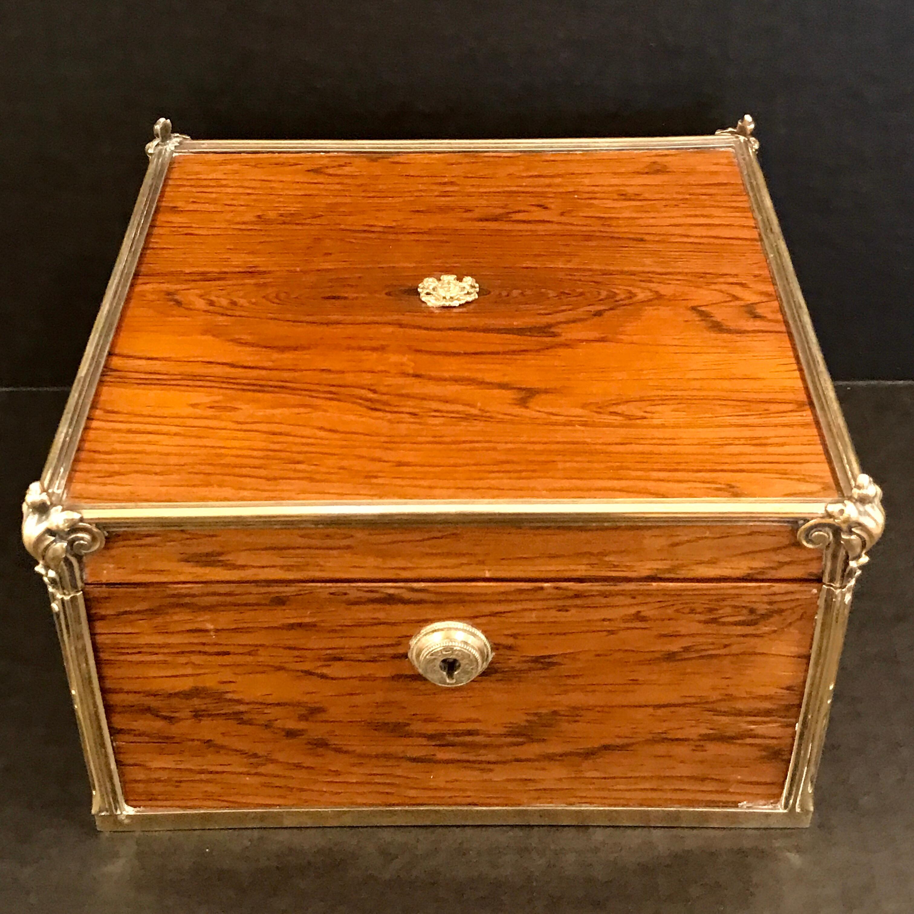 Royal Paul Storr Royal toilet box, London, 1813
of square form, the beautiful amboyna wood case with the silver- gilt Royal Coat of Arms, with silver hallmarked mounts including the screws, hinges, and locks by the master silversmith Paul Storr, the