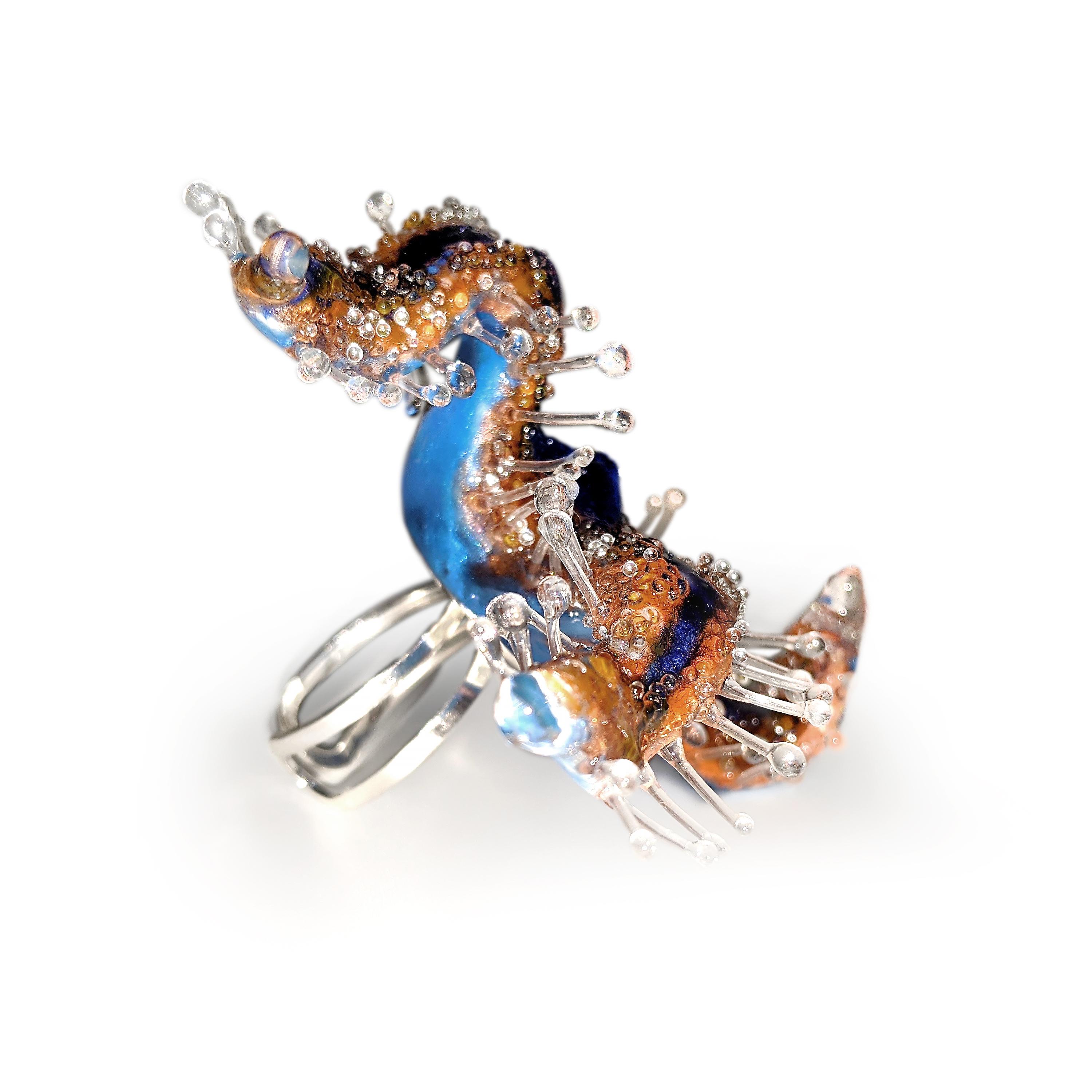 Royal Starfish Ring .  Sea Life Series, 2020. 
Handcrafted. One-of-a-kind sculptural jewelry. Inspired by the universe under the sea. 

Made from polymer clay, resin, pigments, reflective glass beads, mini rhinestones, glass globes, and Silver