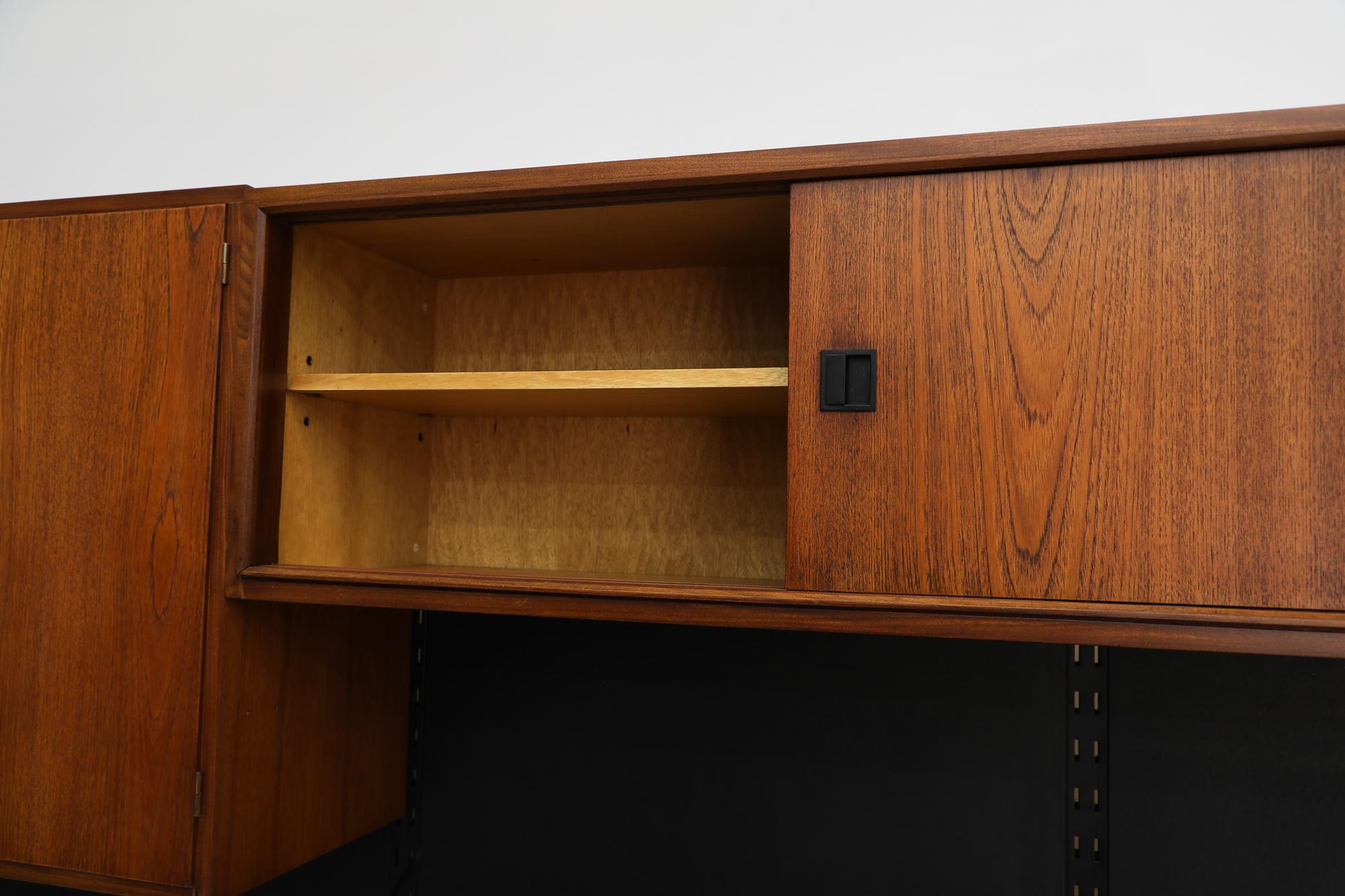 Mid-20th Century Royal System Wall Unit by Poul Cadovius with Black Vinyl Backboards