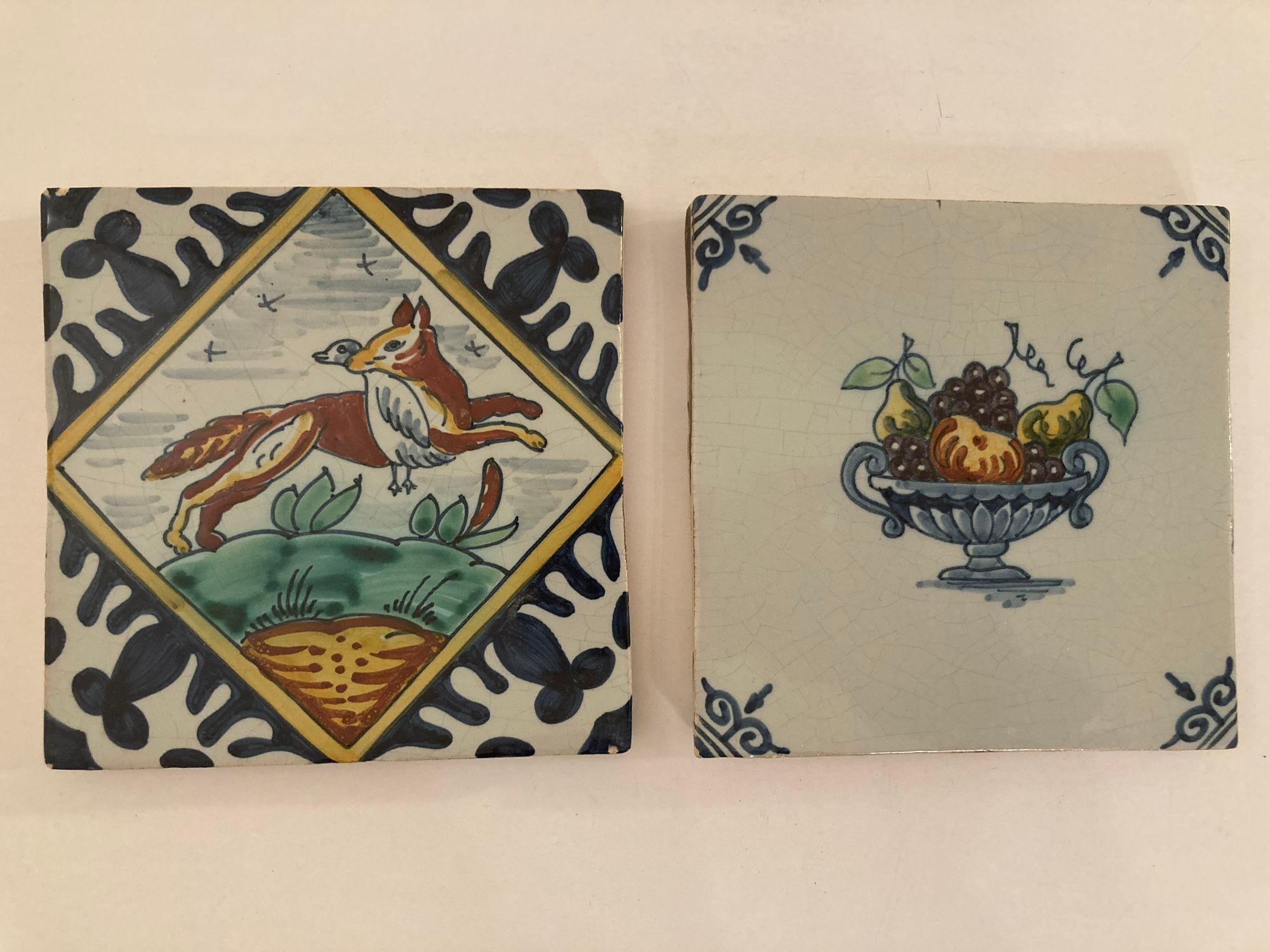 Antique Dutch Delft polychrome tiles - set of 2.
These are two attractive Dutch (Netherlands), Delft ceramic wall tiles, which we date to the late 19th century, circa 1870.
Hand-made by the Royal Tickelaar of Makkum, the oldest pottery and tile